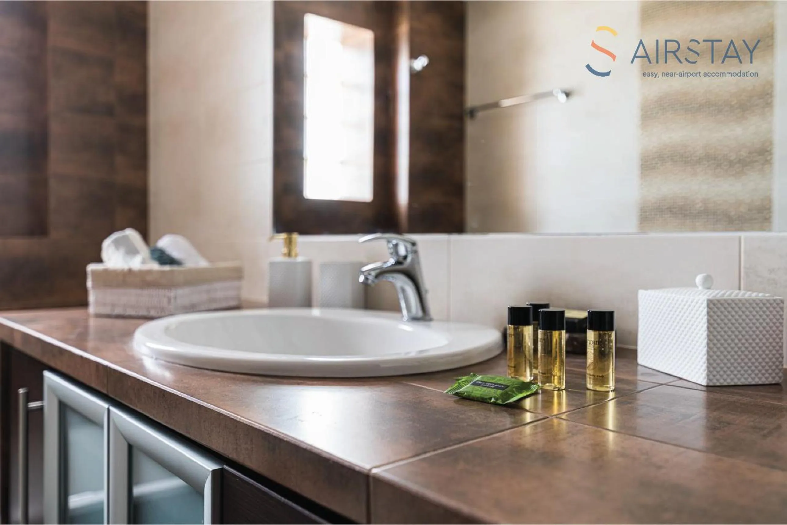 Bathroom in Thresh Apartments Airport by Airstay