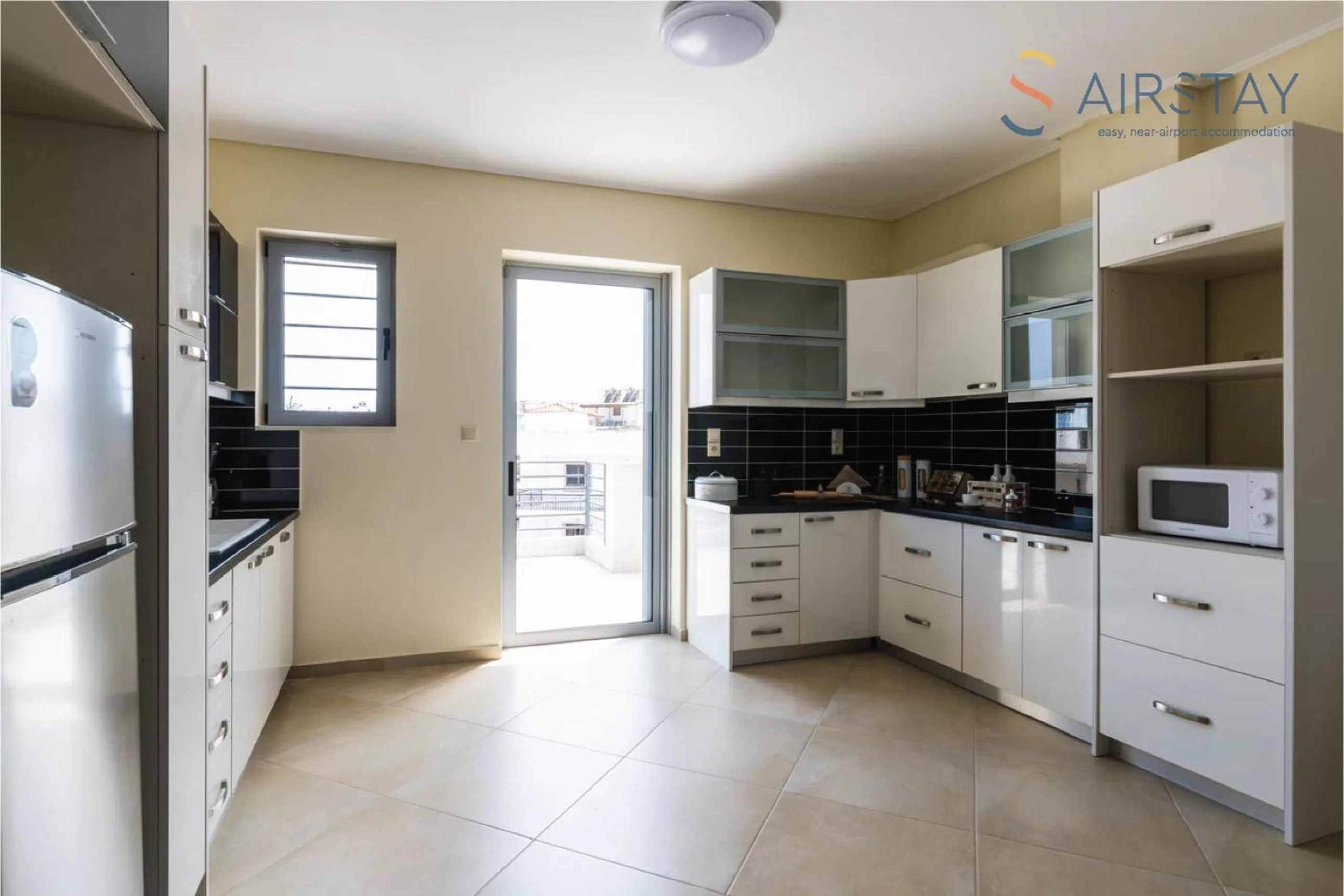 minibar in Thresh Apartments Airport by Airstay