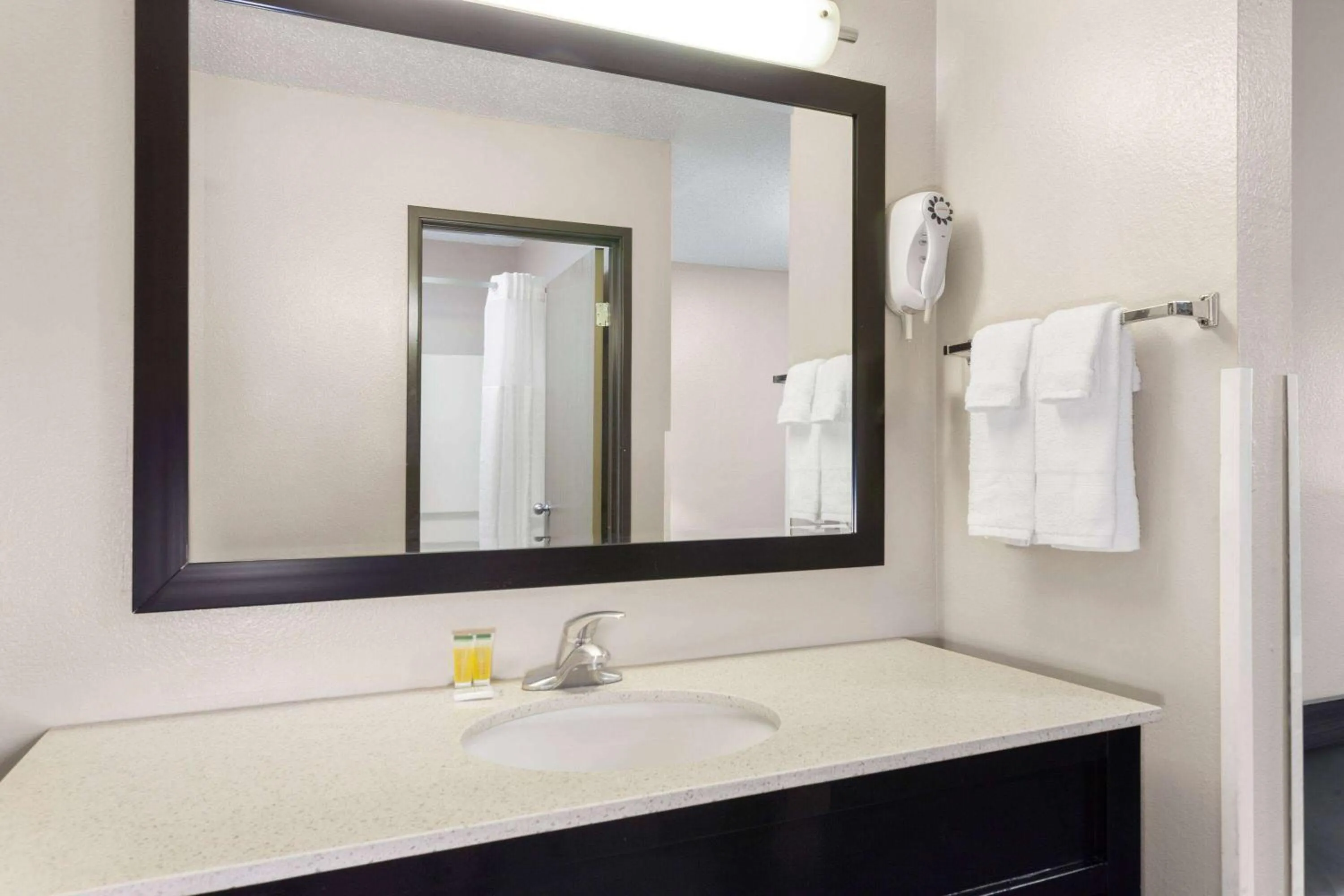 Bathroom in Super 8 by Wyndham Mt. Vernon