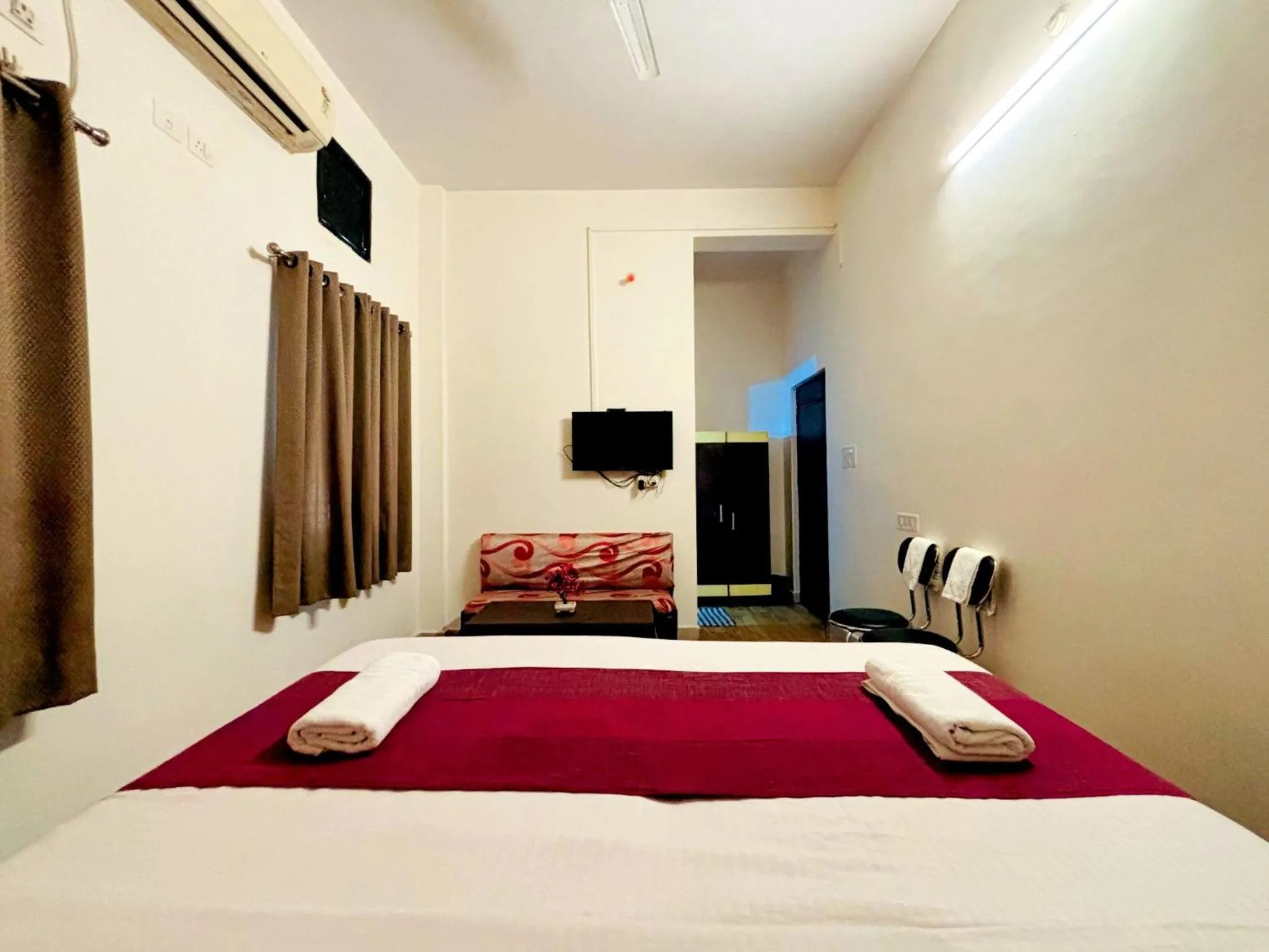 Bed in Hotel Sunrise Inn