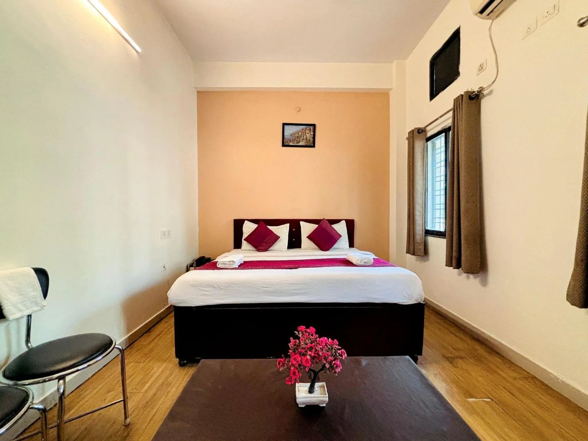 Bed in Hotel Sunrise Inn