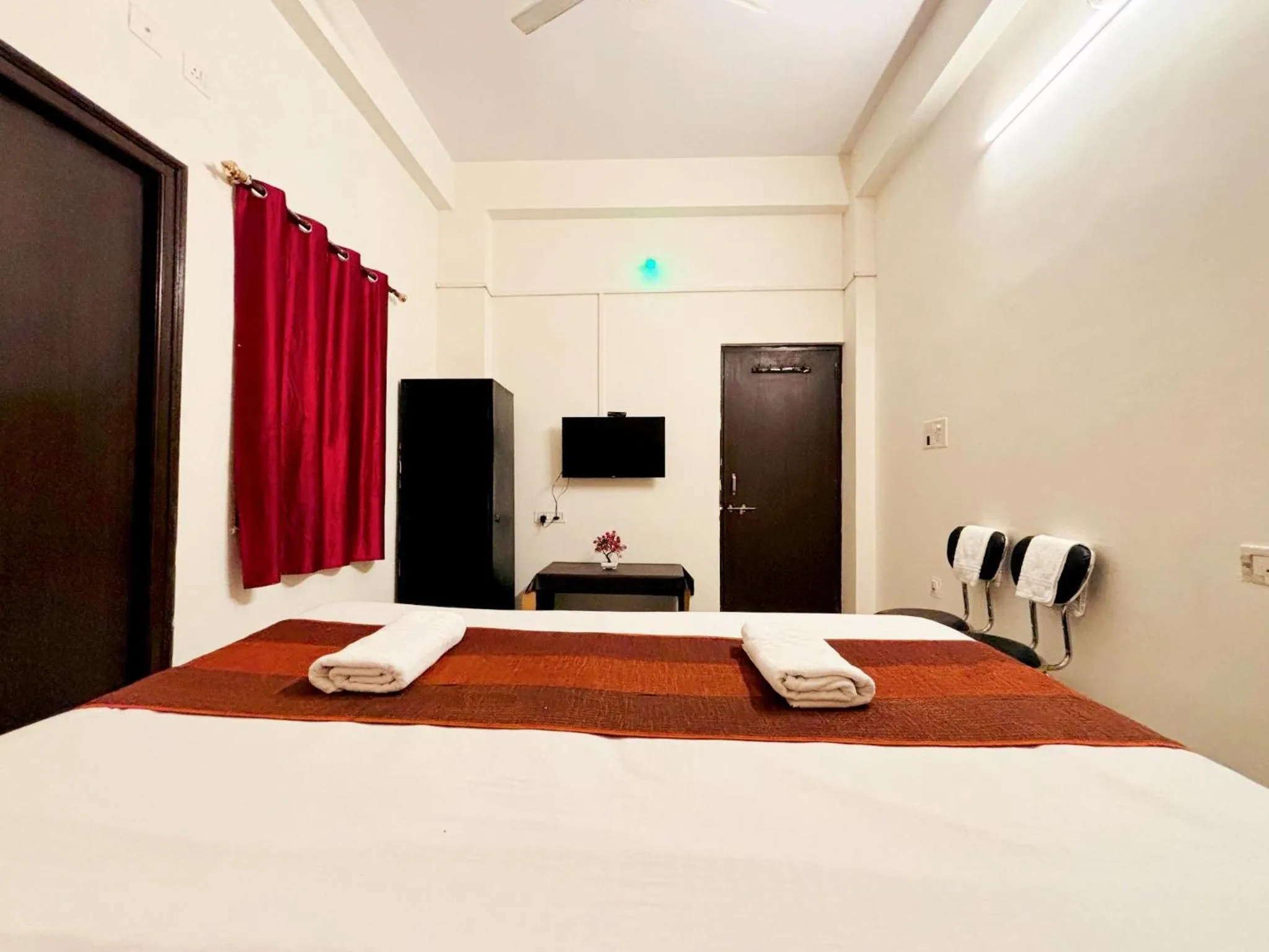 Bed in Hotel Sunrise Inn