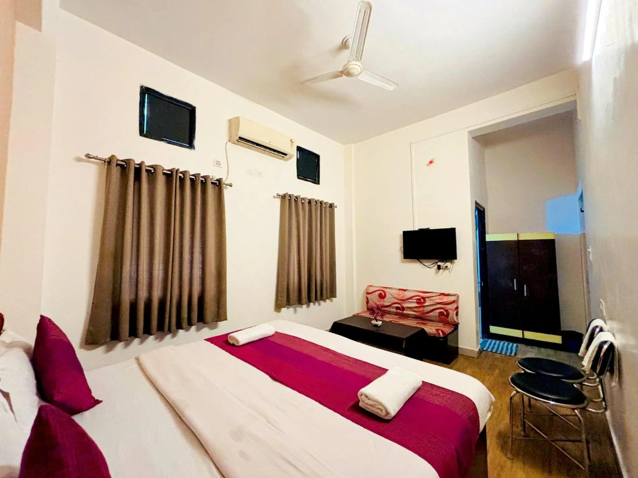 Bed in Hotel Sunrise Inn