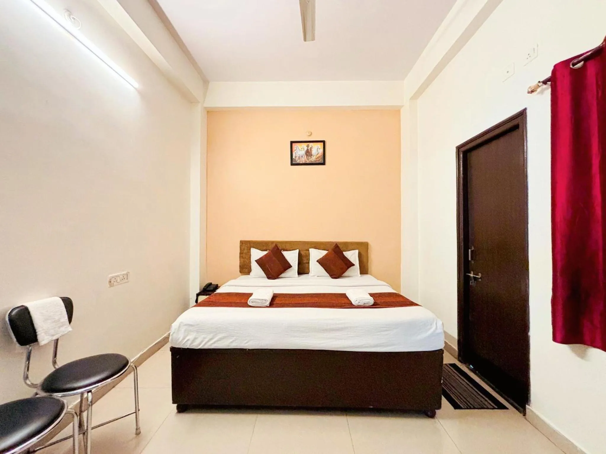 Bed in Hotel Sunrise Inn