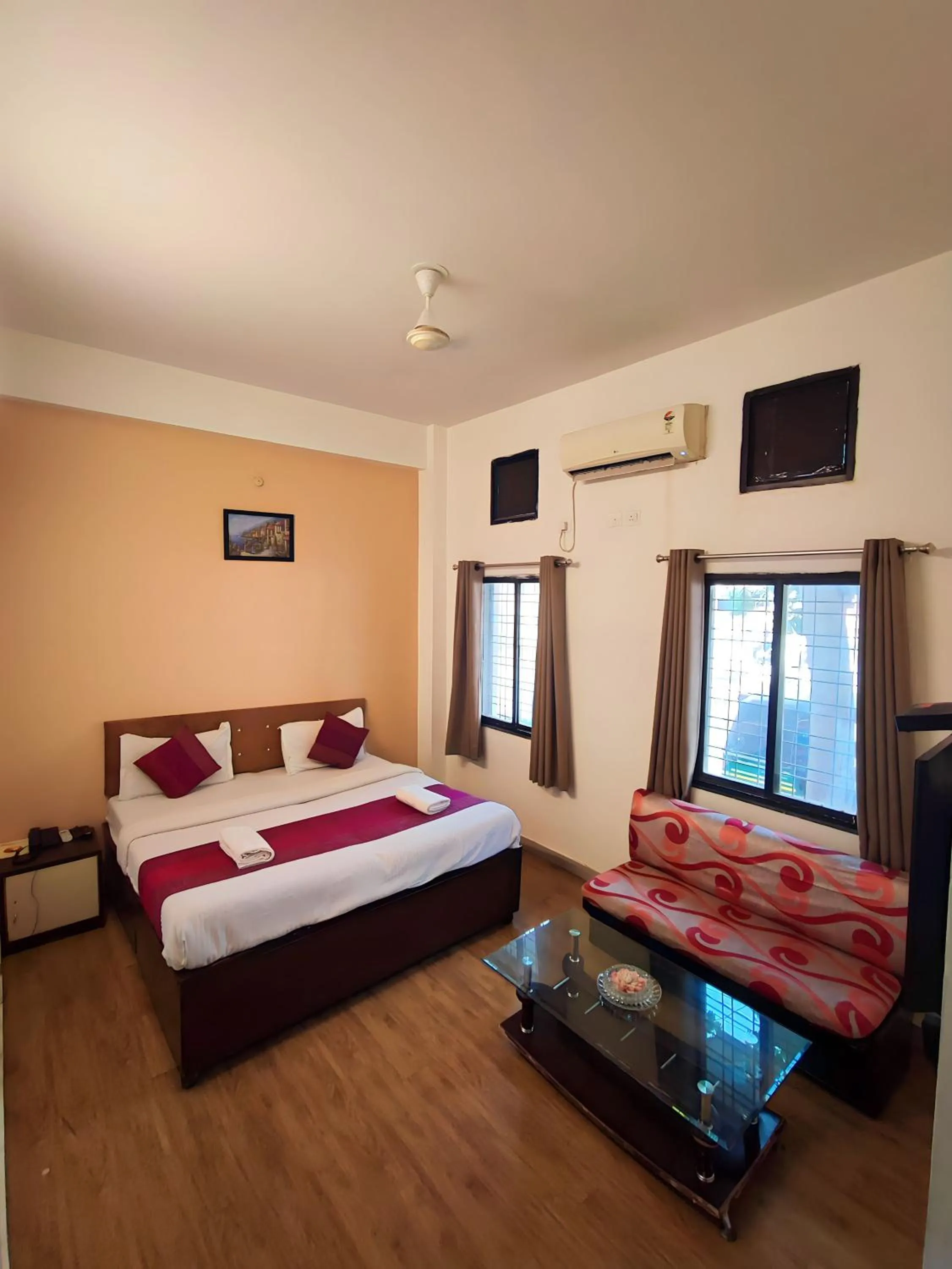 Bed in Hotel Sunrise Inn