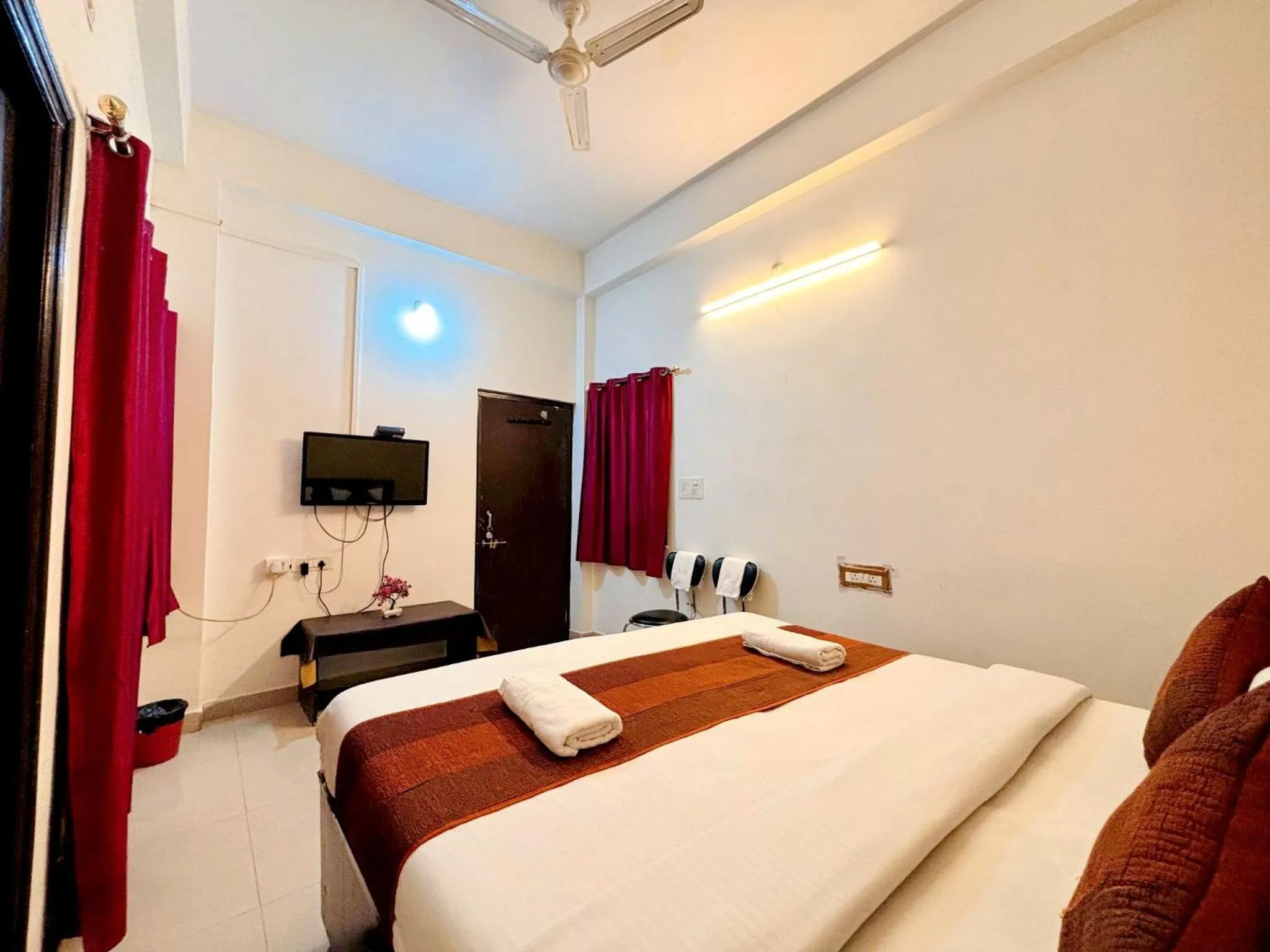 Bed in Hotel Sunrise Inn