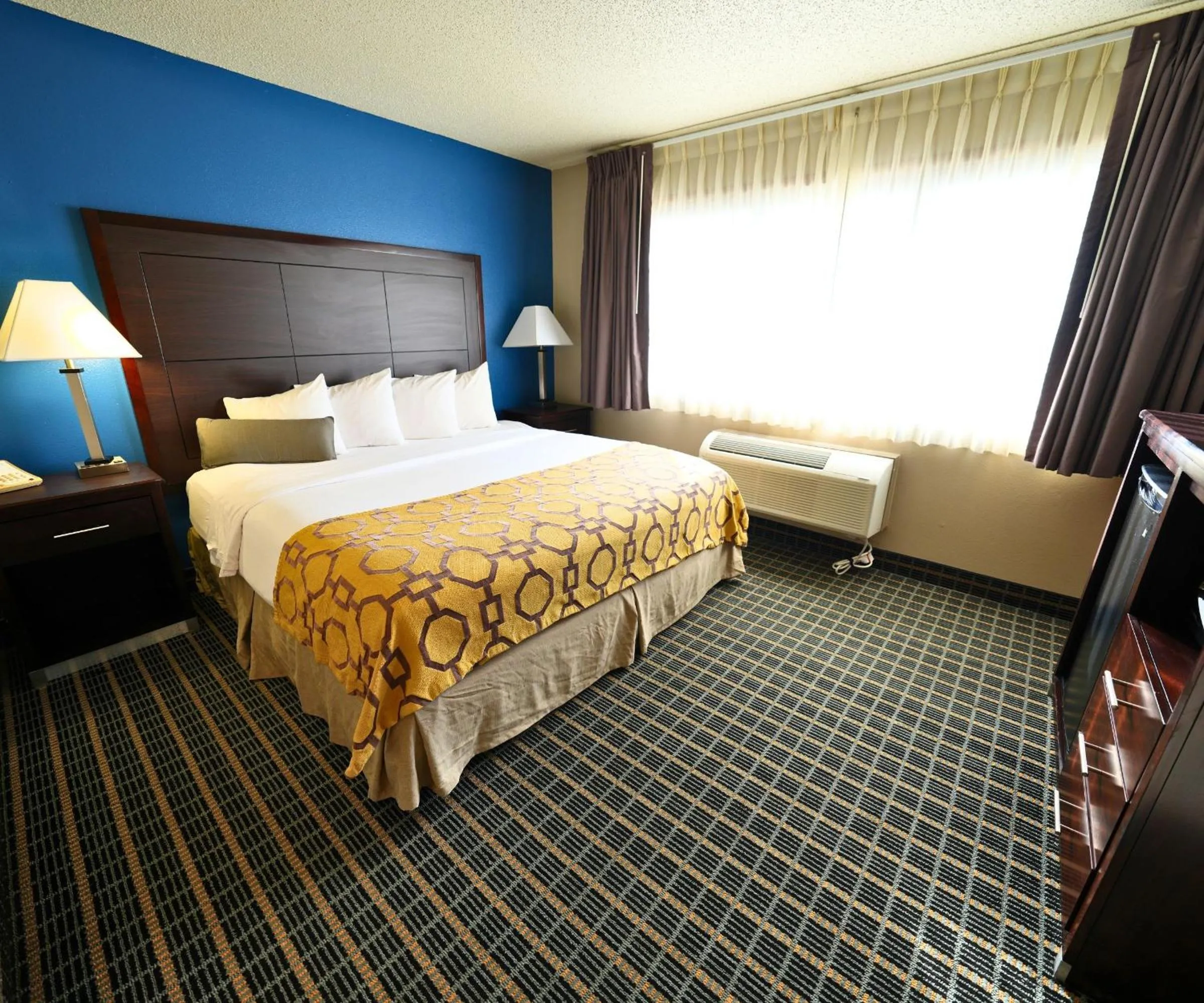 Bed in Baymont by Wyndham Marshalltown