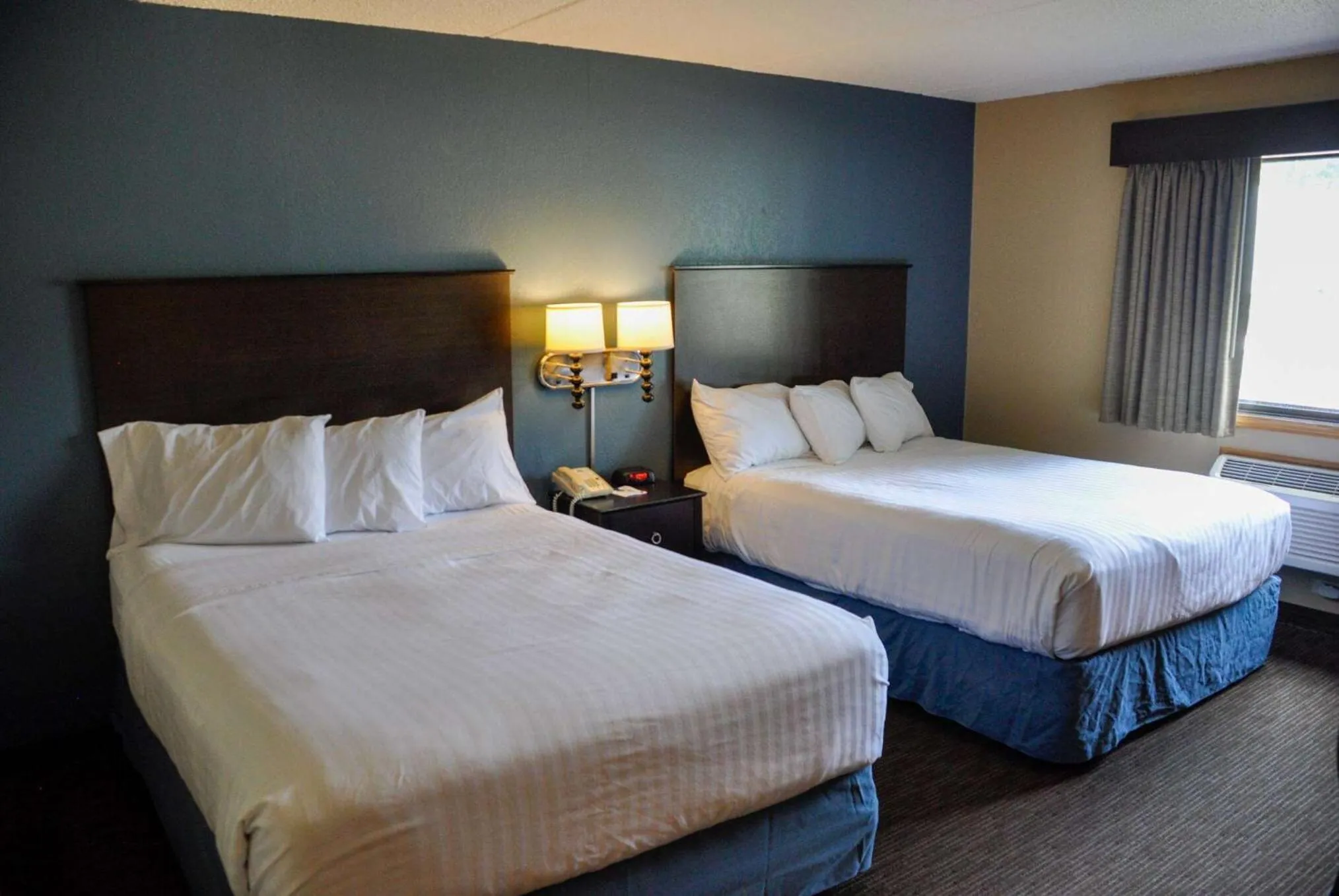 Photo of the whole room, Bed in AmericInn by Wyndham Clear Lake