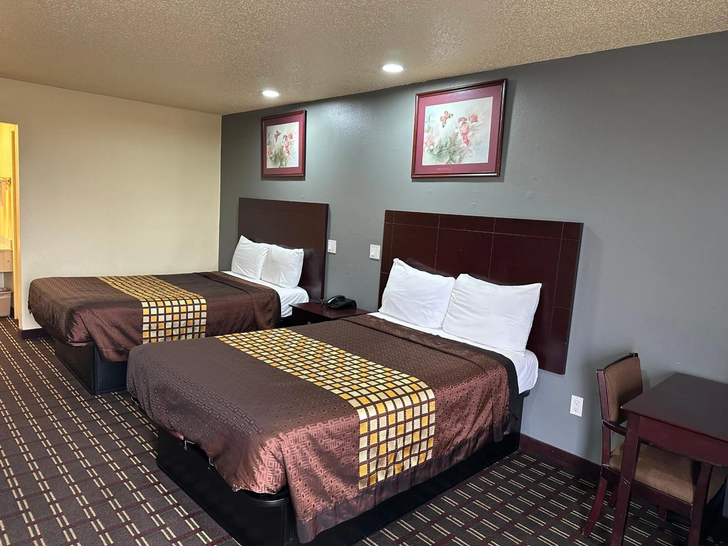 Bed in Executive Inn & Suites Prescott