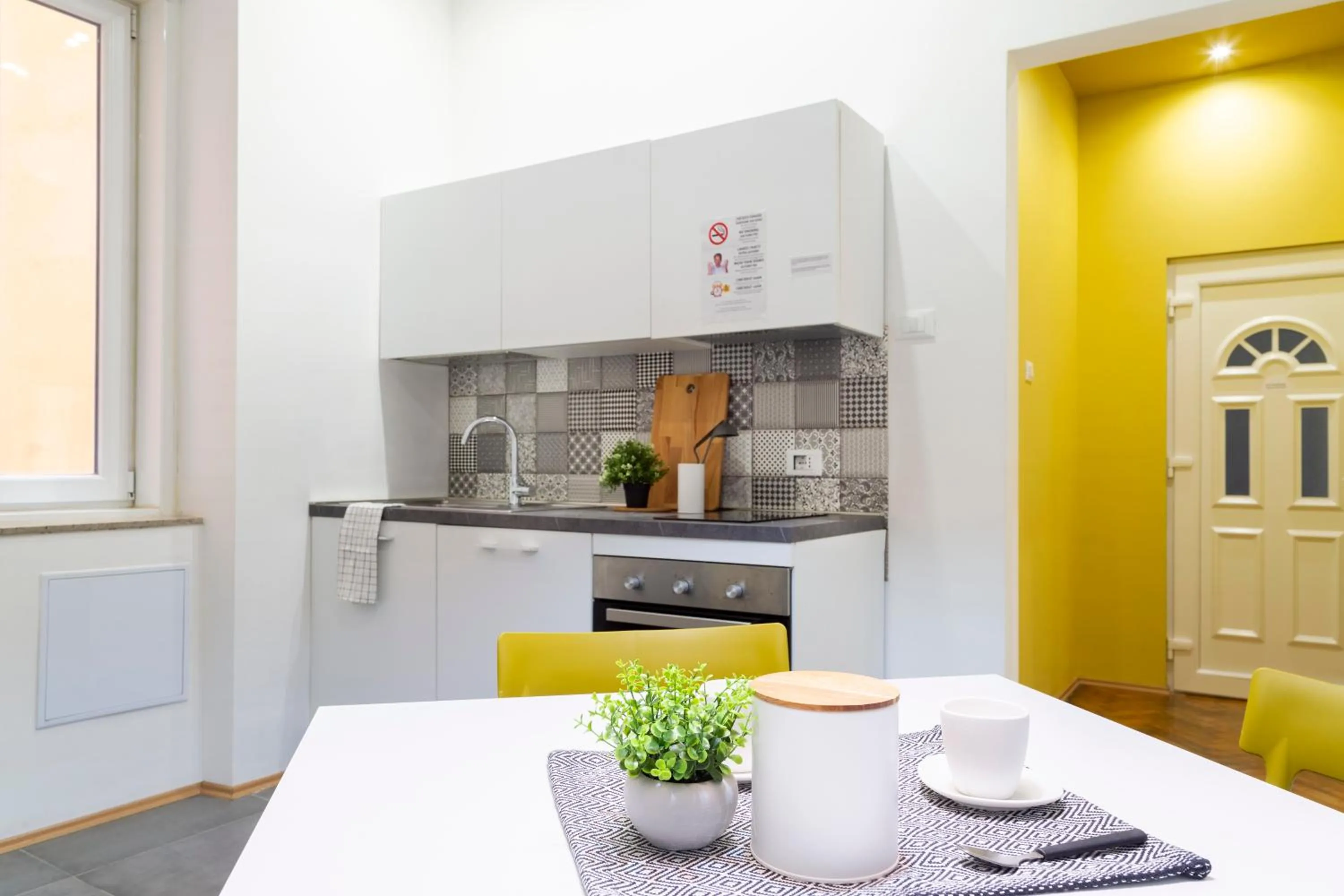 Kitchen or kitchenette in Elegante appartamento vicino alla stazione - Gold