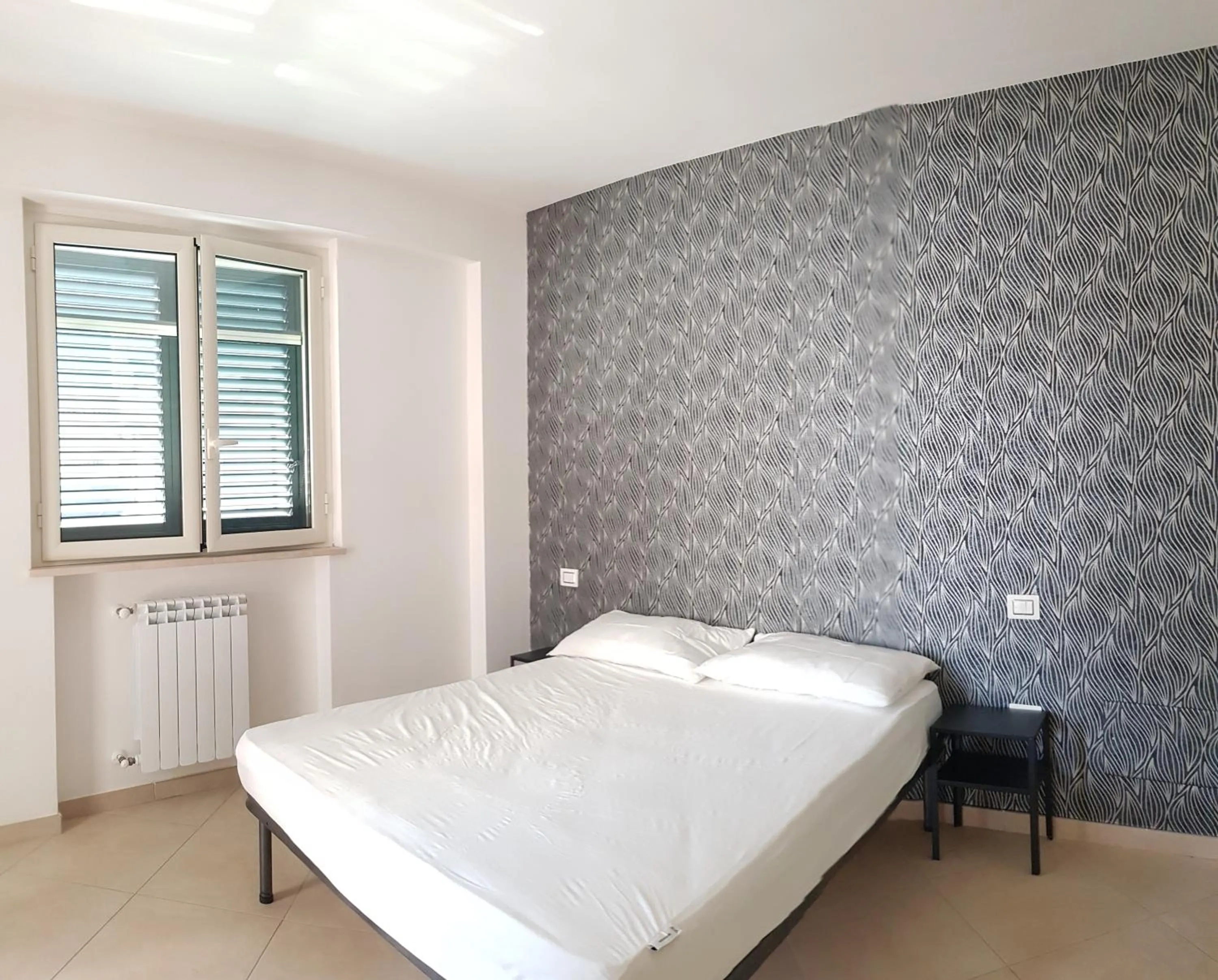 Bedroom, Bed in Punto Blu Relax