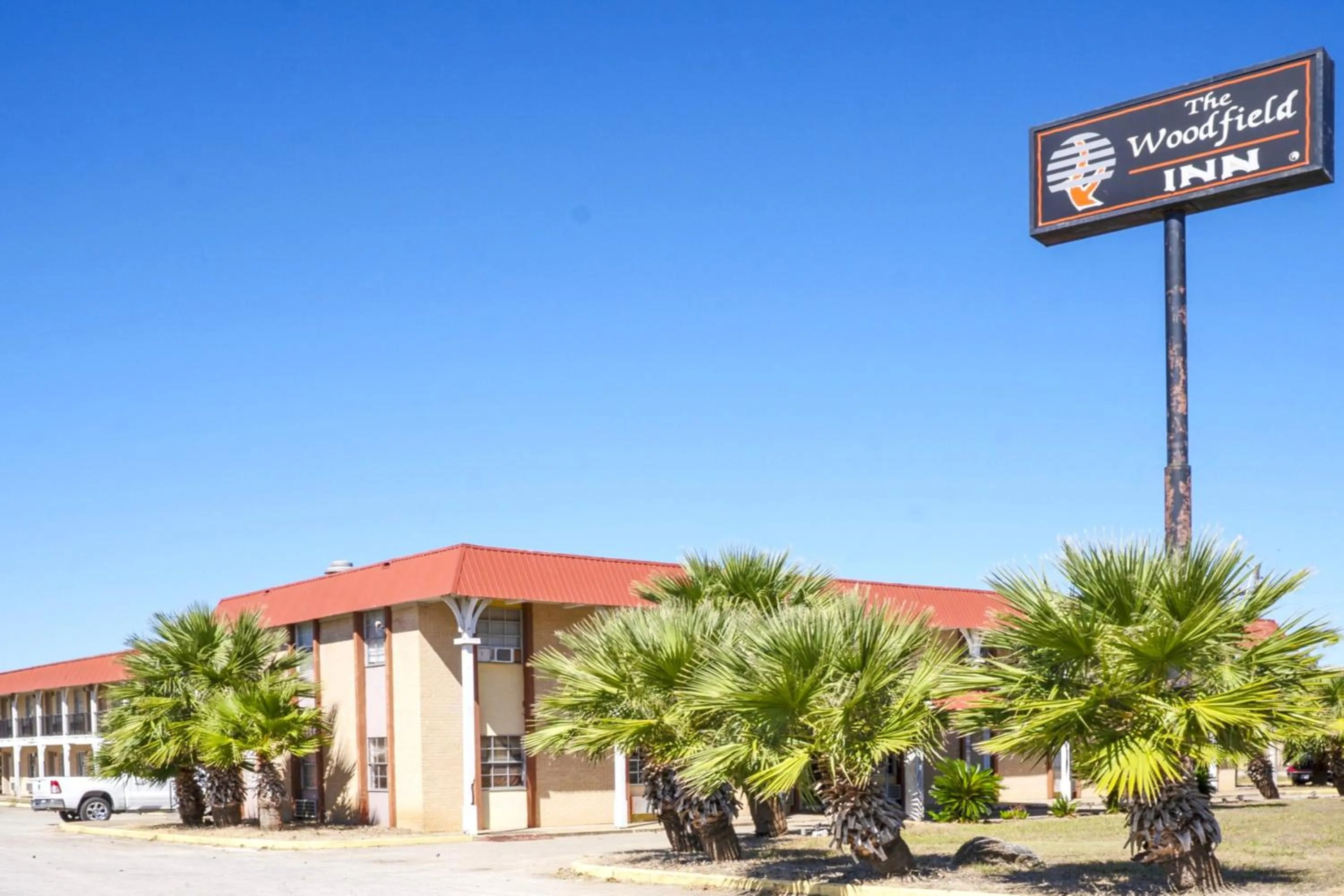 Property building in Woodfield Inn & Suites Hotel O, Yoakum TX 111