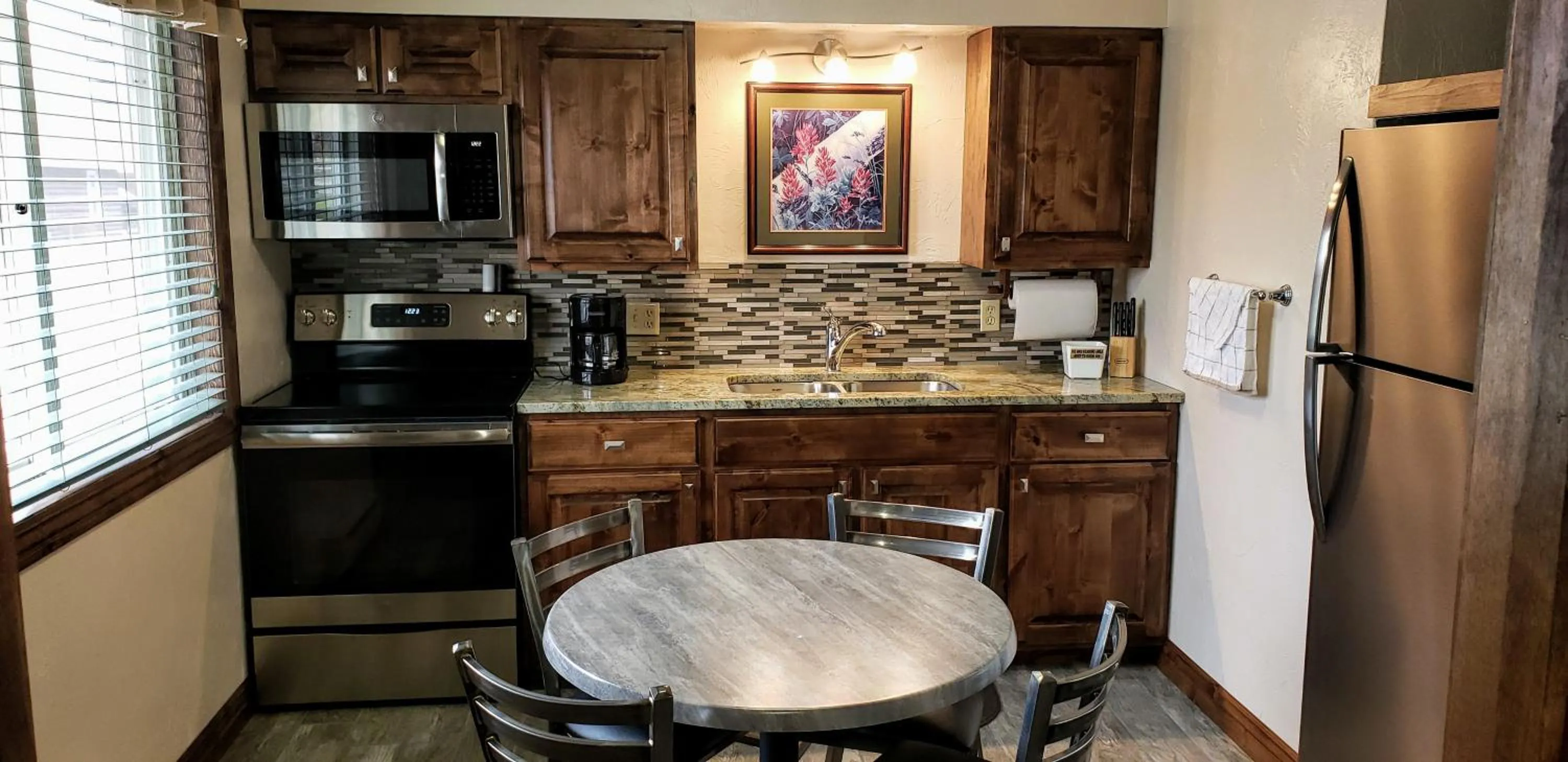 Kitchen or kitchenette in Stagecoach Inn & Suites