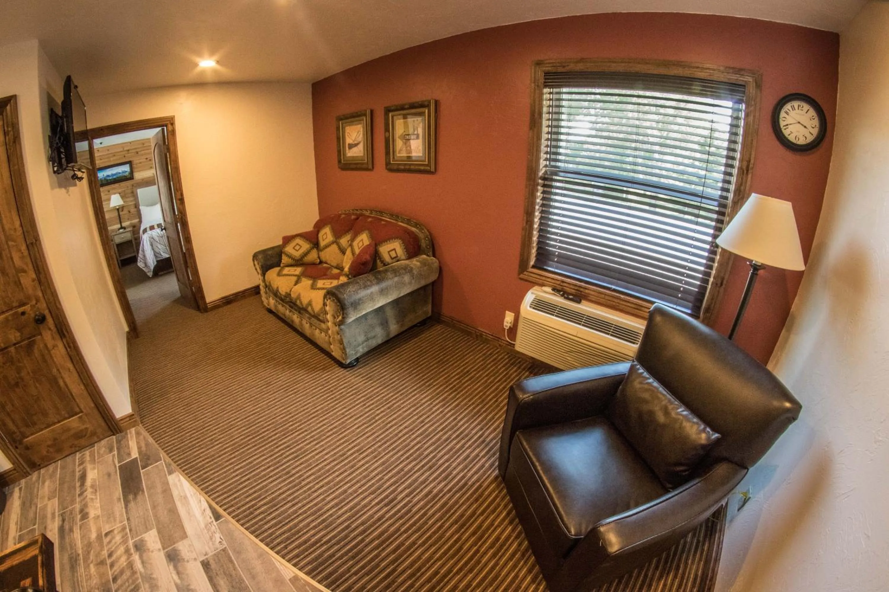 Living room in Stagecoach Inn & Suites