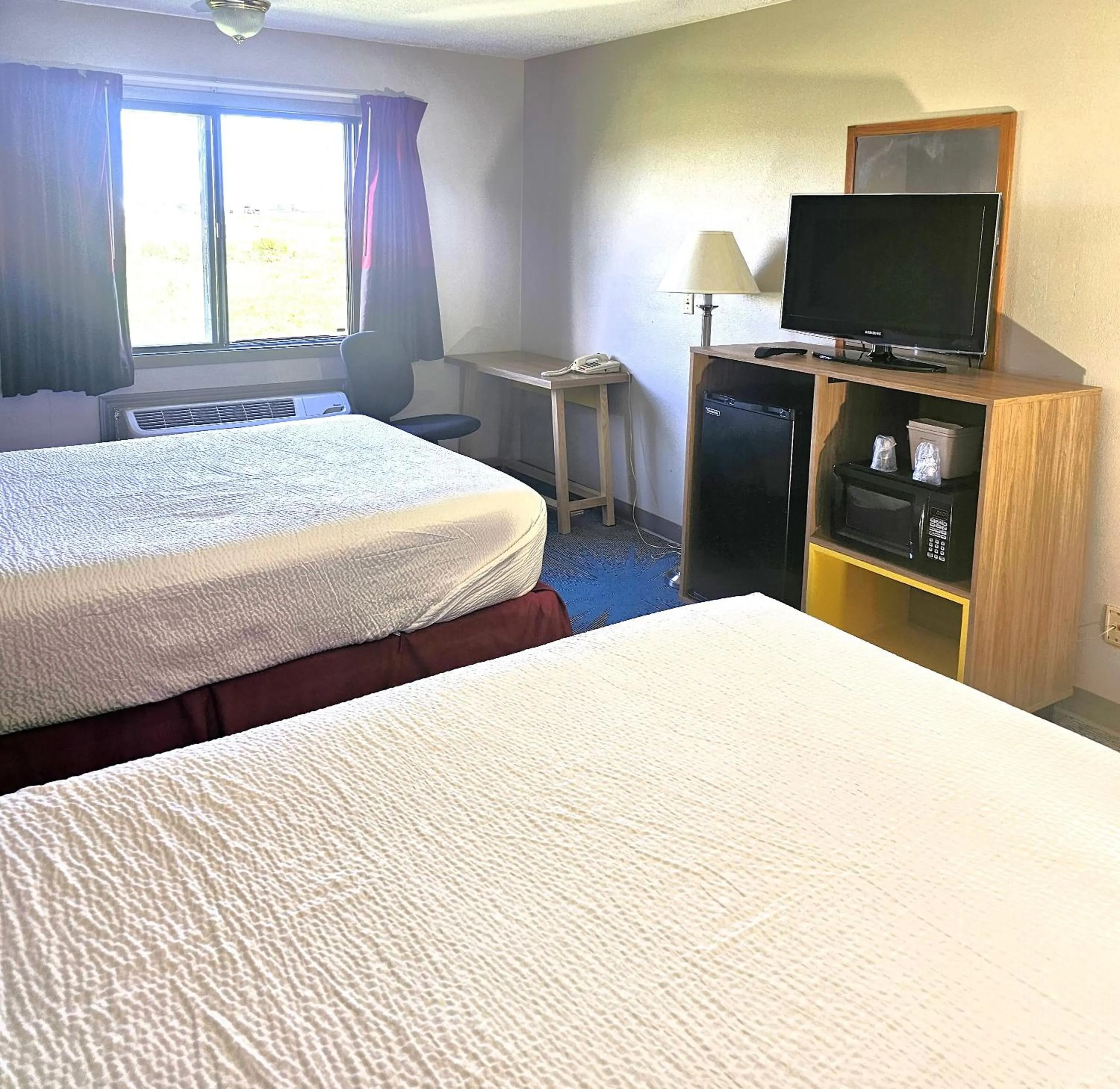 Bed in Days Inn by Wyndham North Sioux City