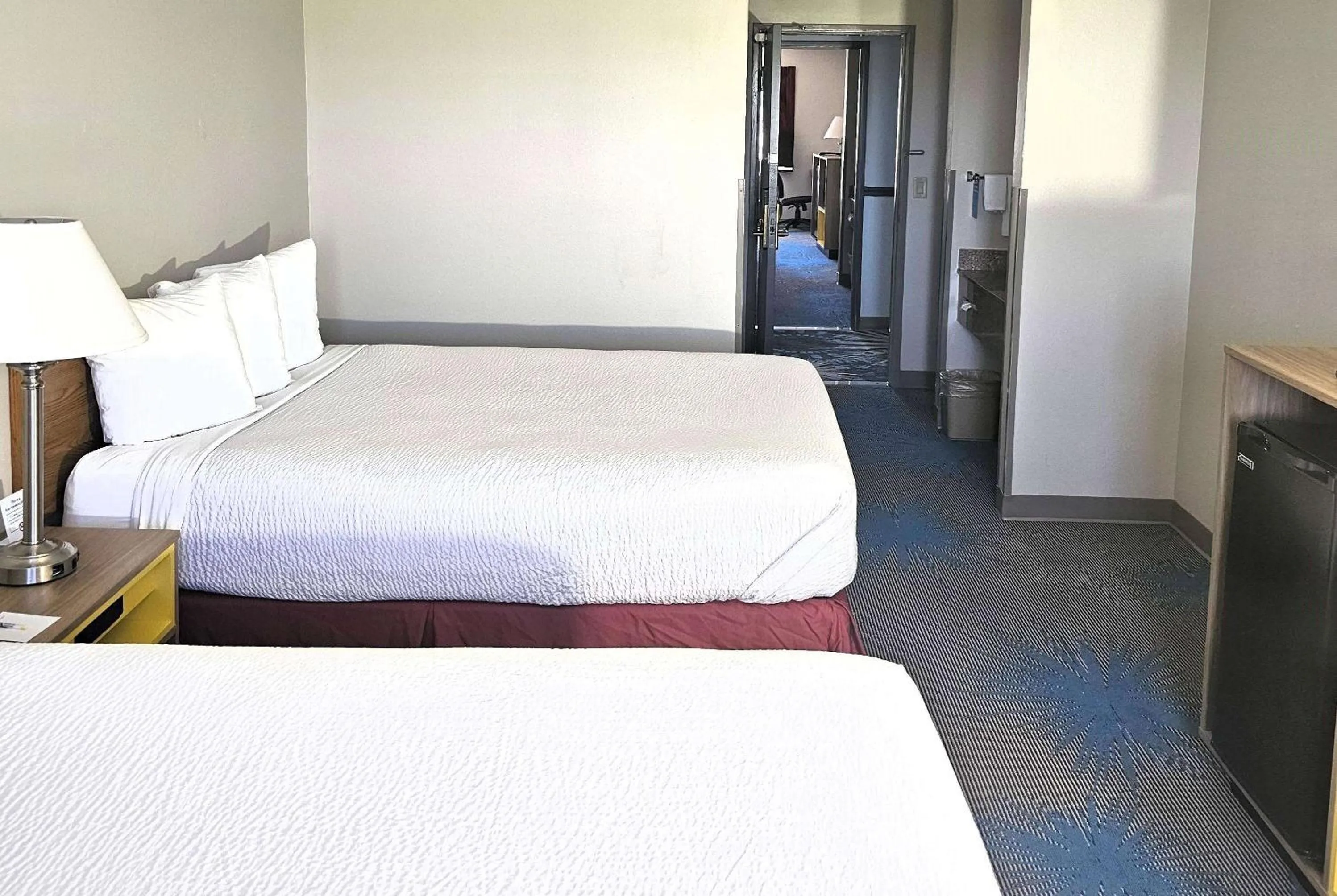Photo of the whole room, Bed in Days Inn by Wyndham North Sioux City
