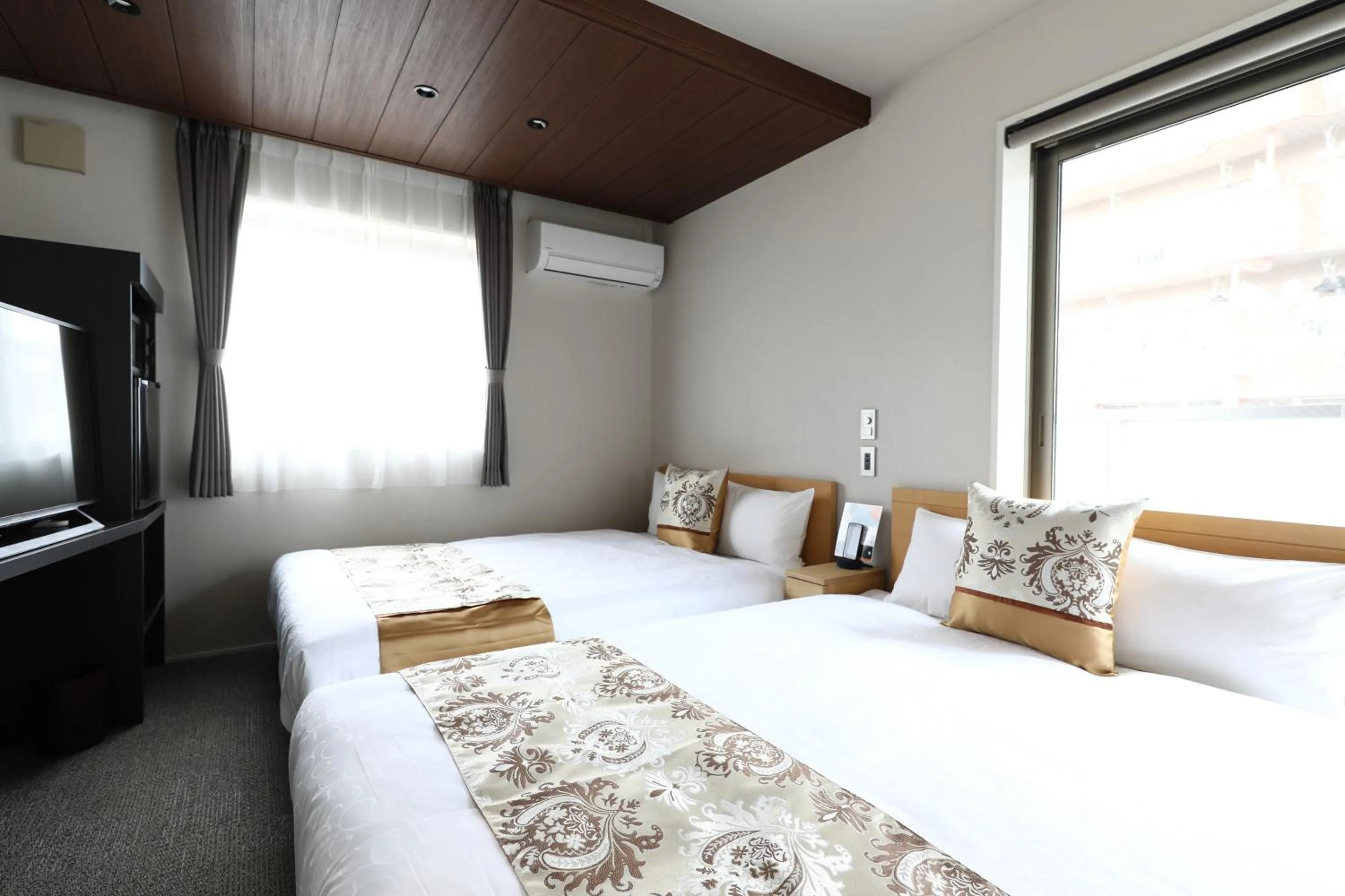 Bed in GRAND BASE Hakata City