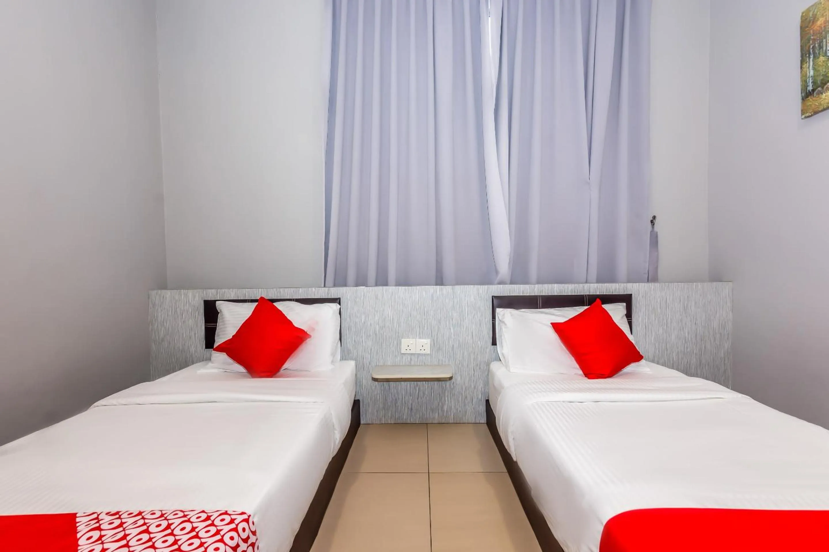 Bedroom in OYO 1185 Ho Hotel