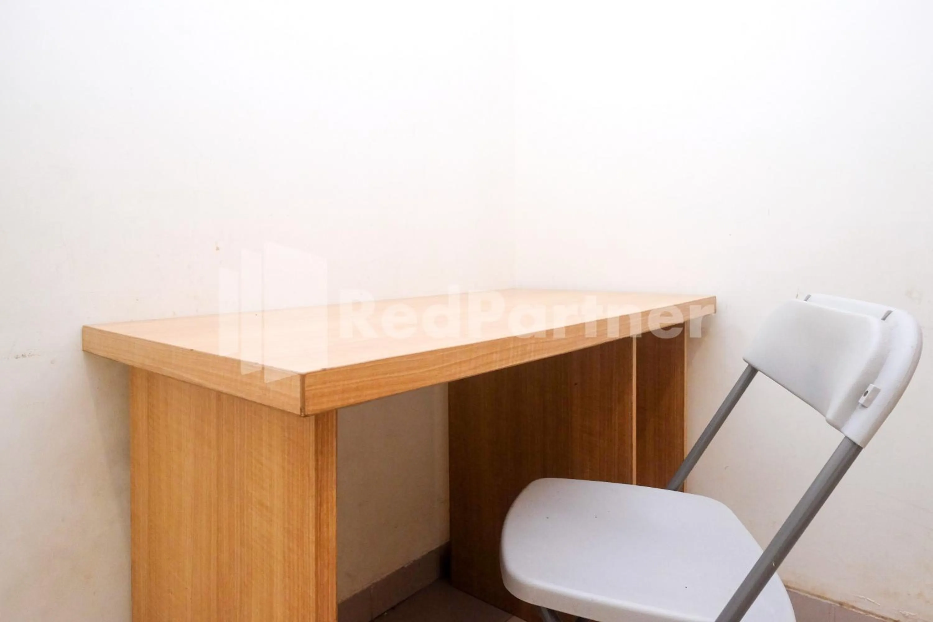 Bedroom in Garuda Guesthouse Yogyakarta RedPartner