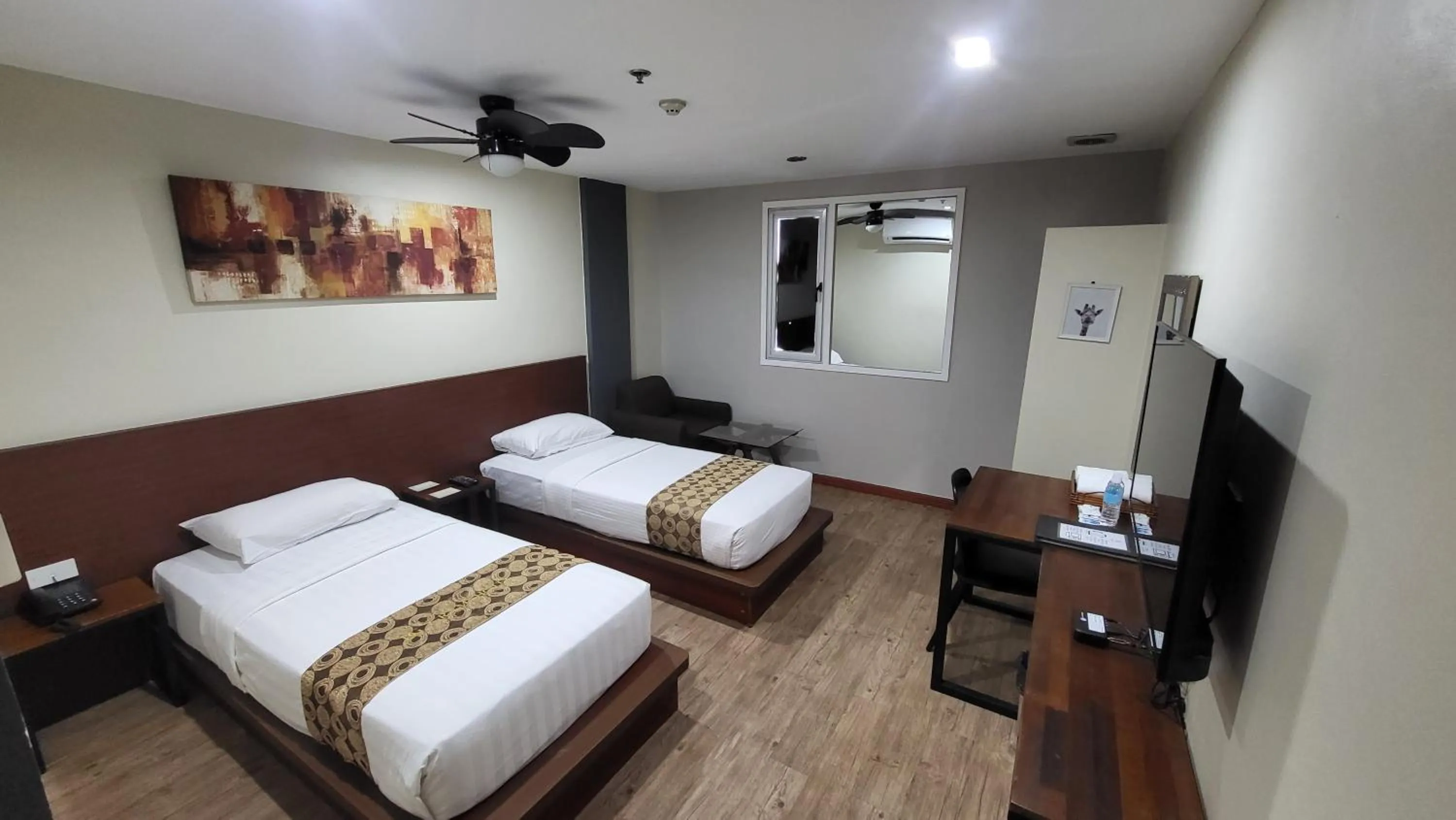 Photo of the whole room, Bed in DG Grami Hotel