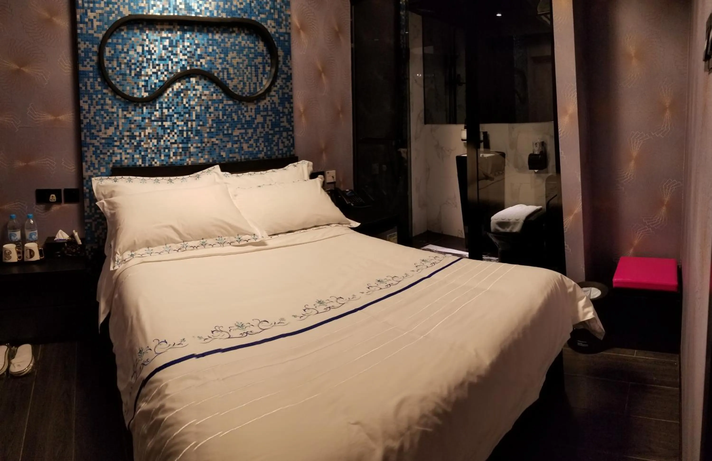 Bed in Star City Hotel