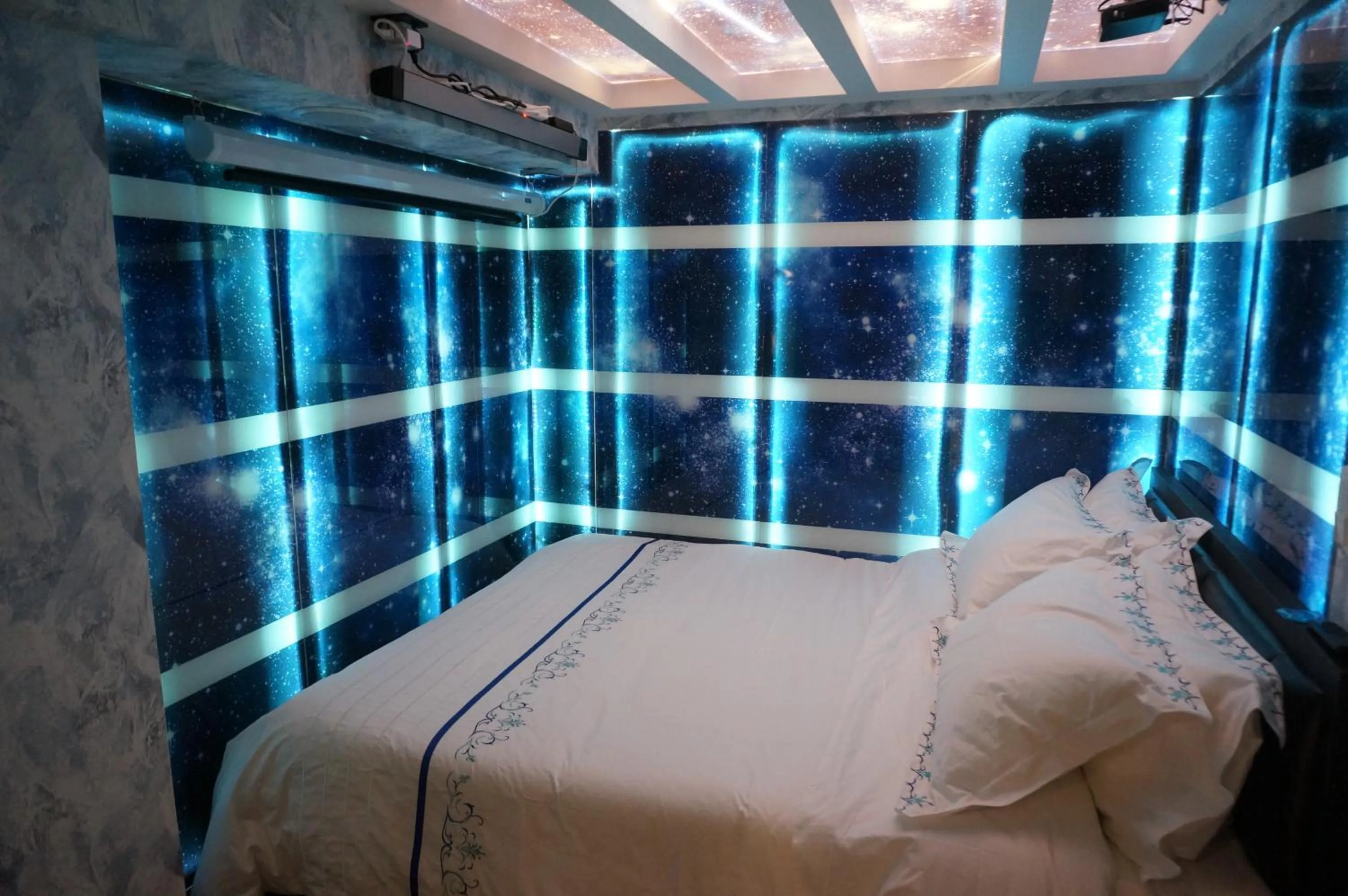 Bed in Star City Hotel