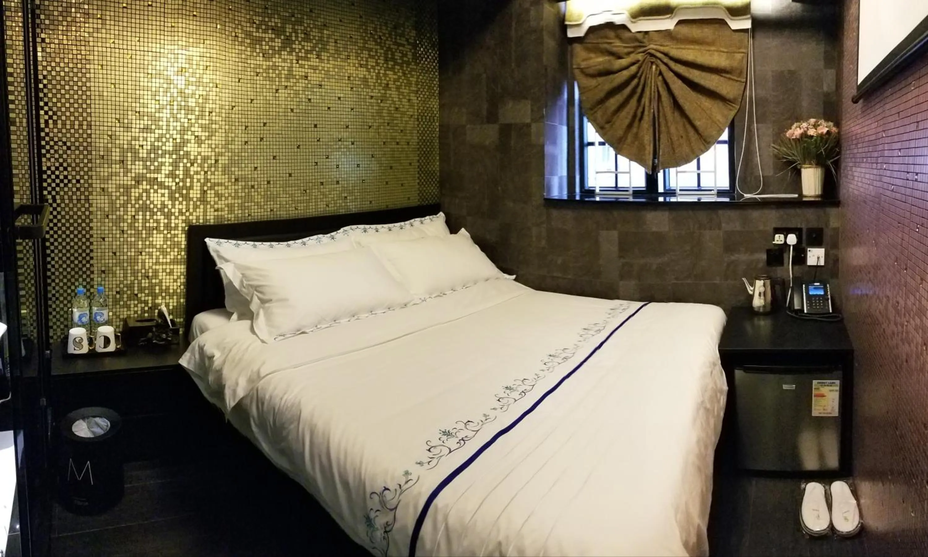 Bed in Star City Hotel