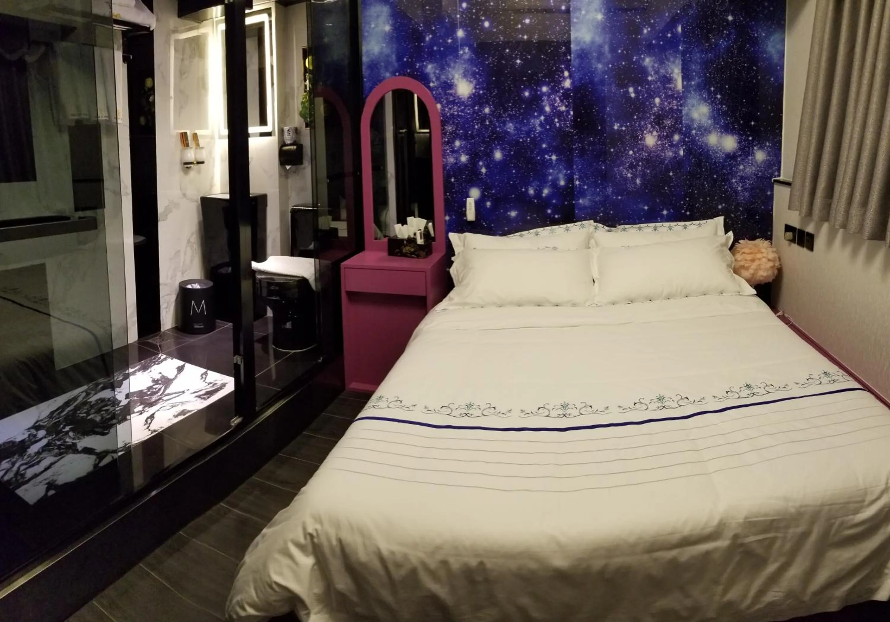 Bed in Star City Hotel