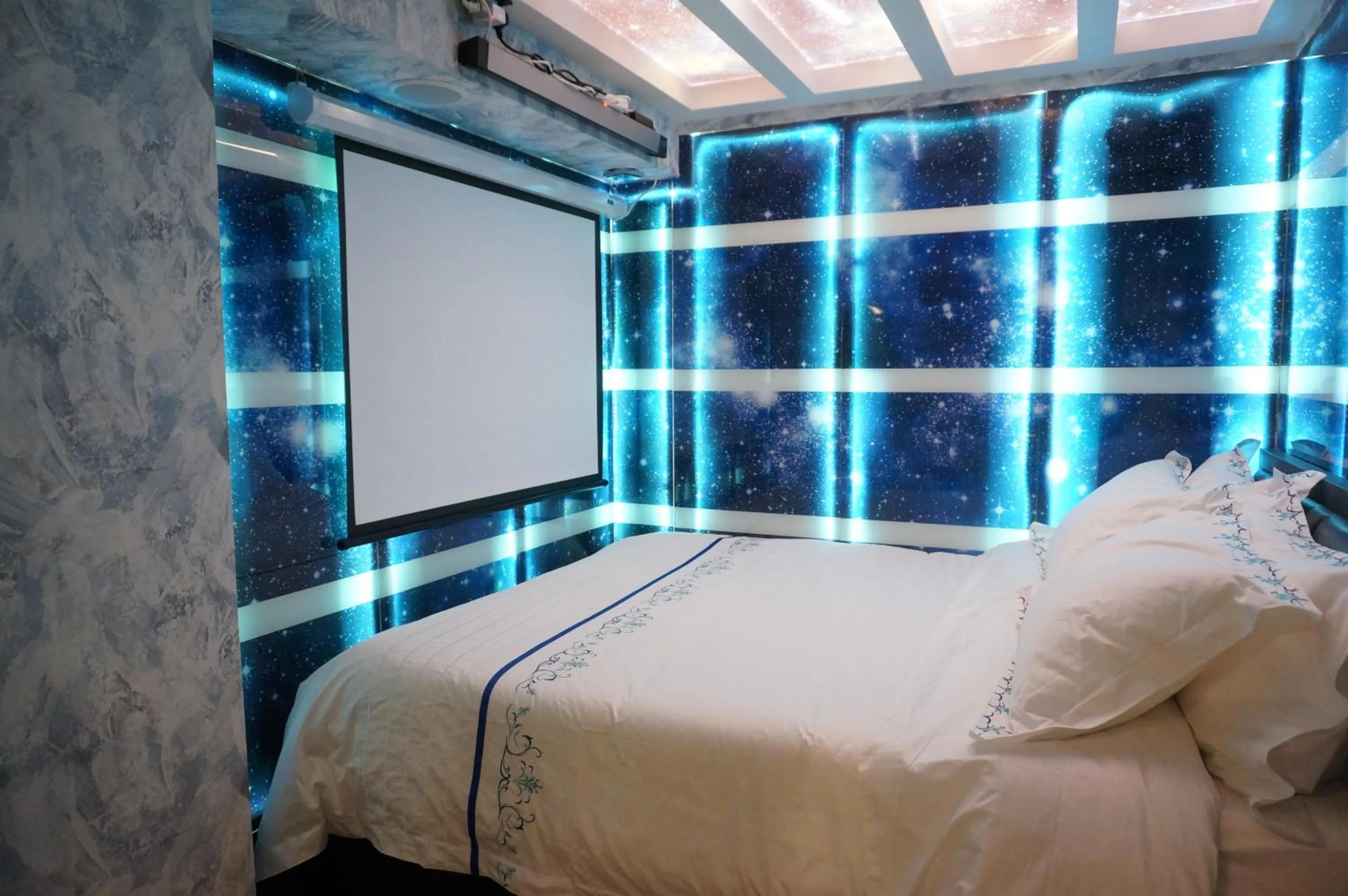 Bed in Star City Hotel