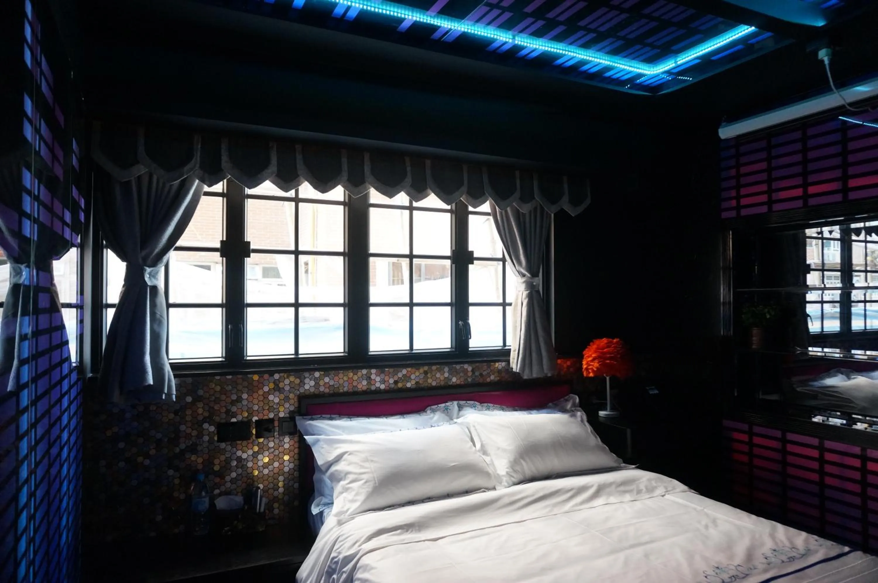 Bed in Star City Hotel