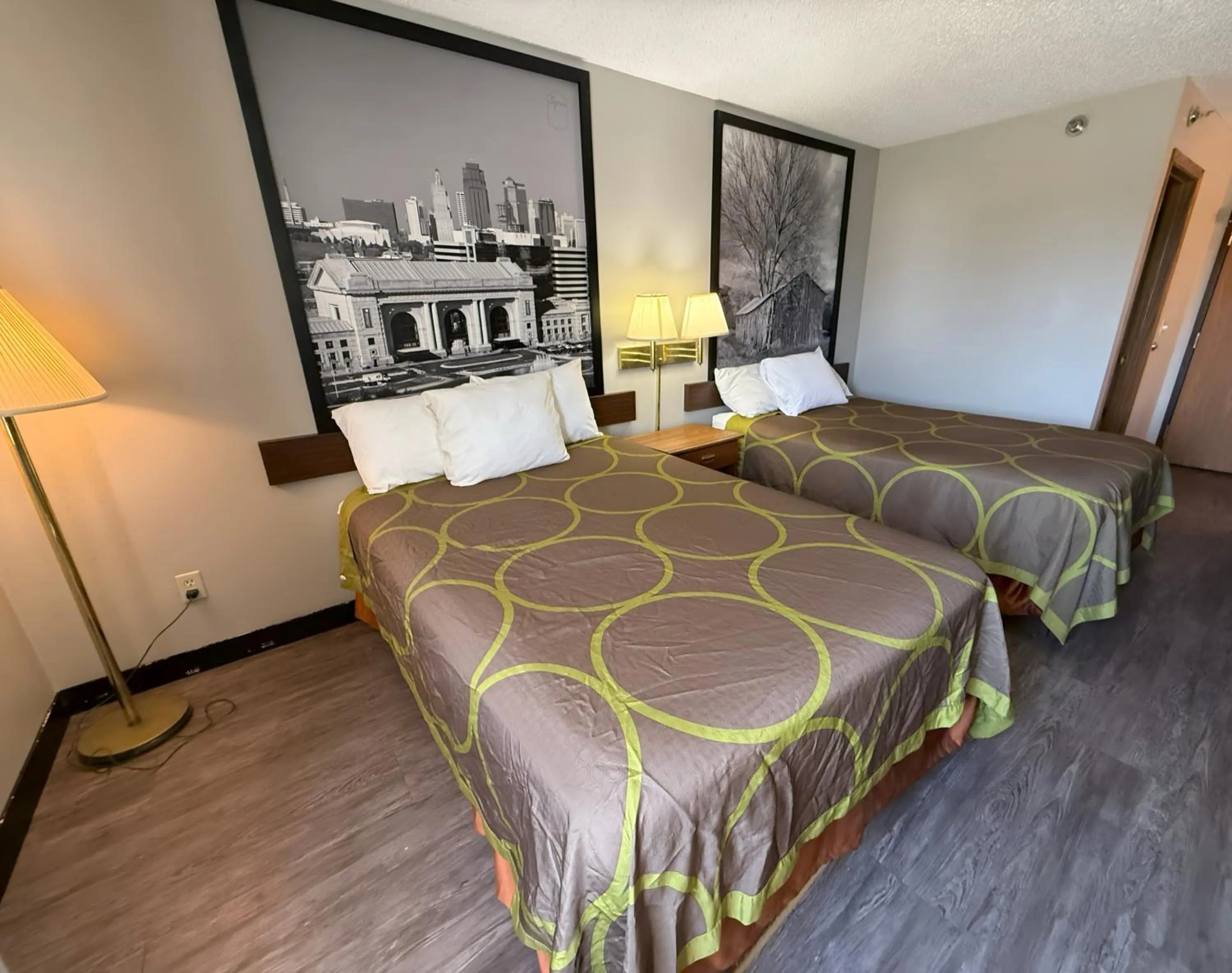 Bed in Super 8 by Wyndham Smithville Kansas City