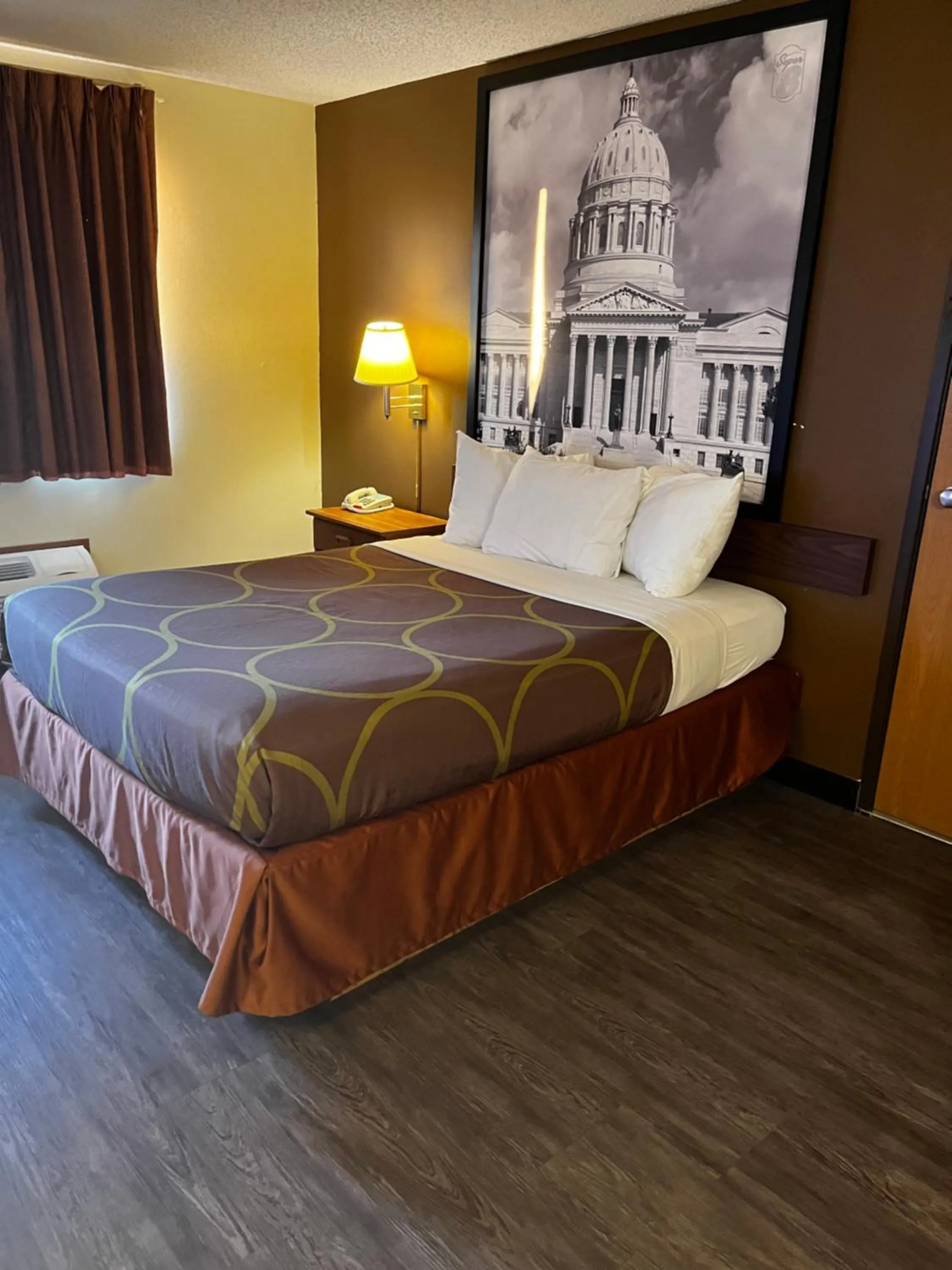 Bed in Super 8 by Wyndham Smithville Kansas City