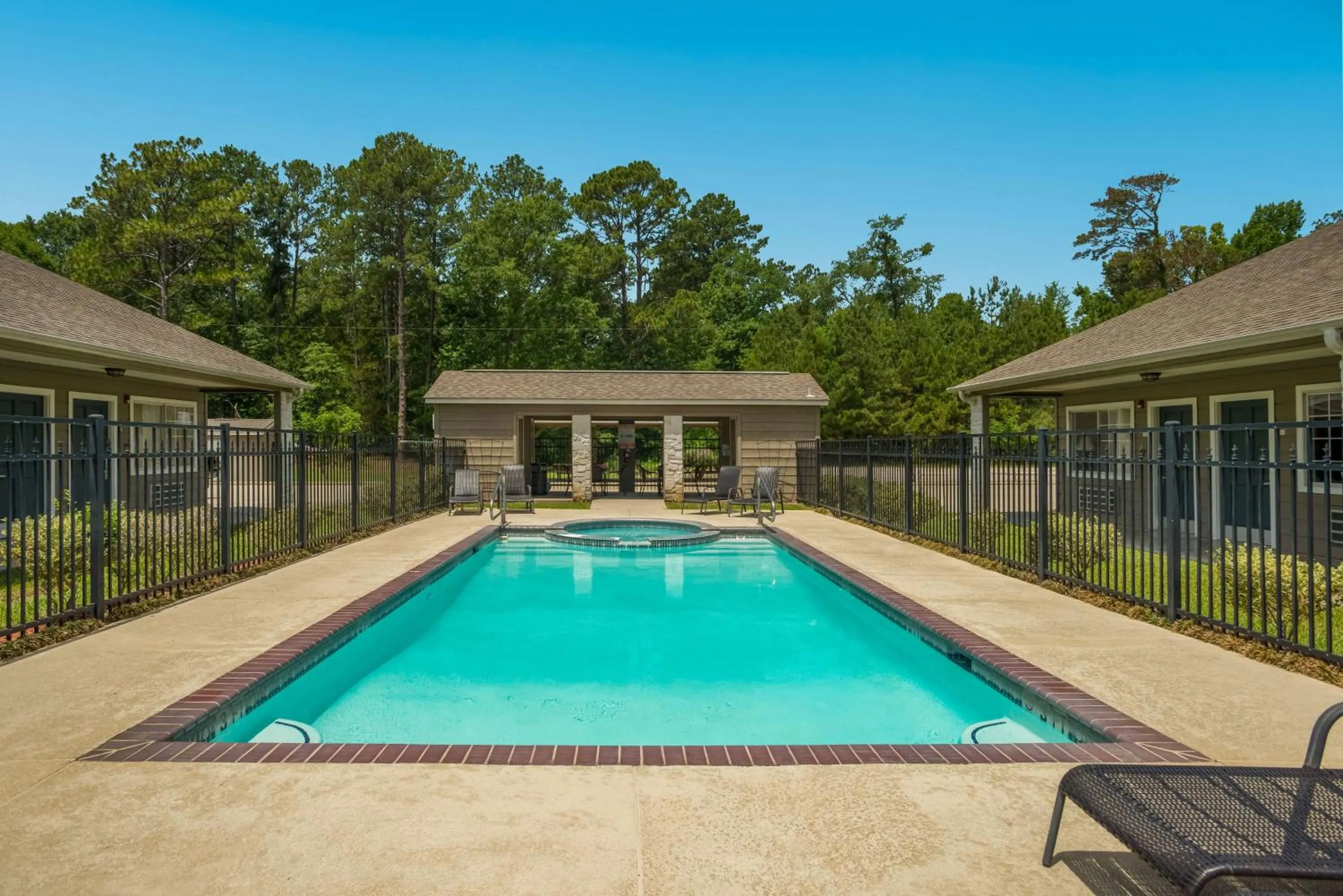 Pool view in SureStay Hotel by Best Western Leesville