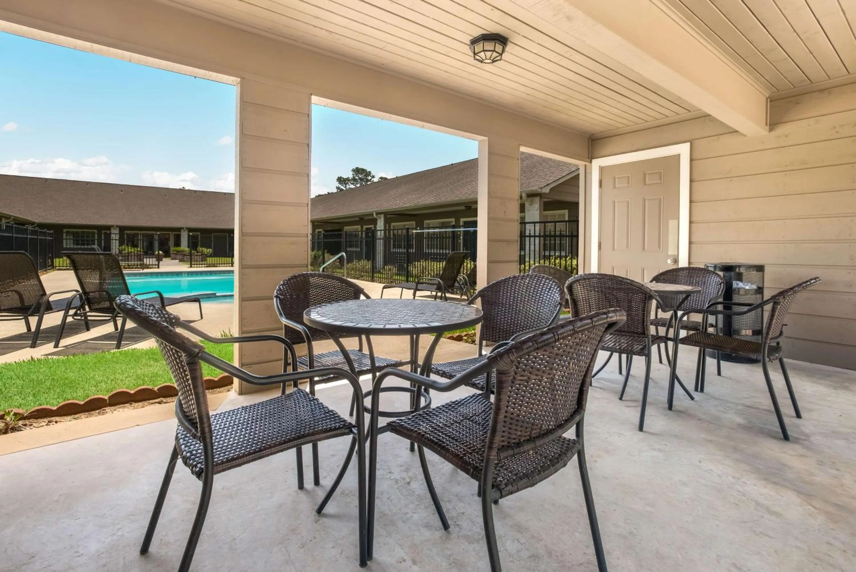 Pool view in SureStay Hotel by Best Western Leesville