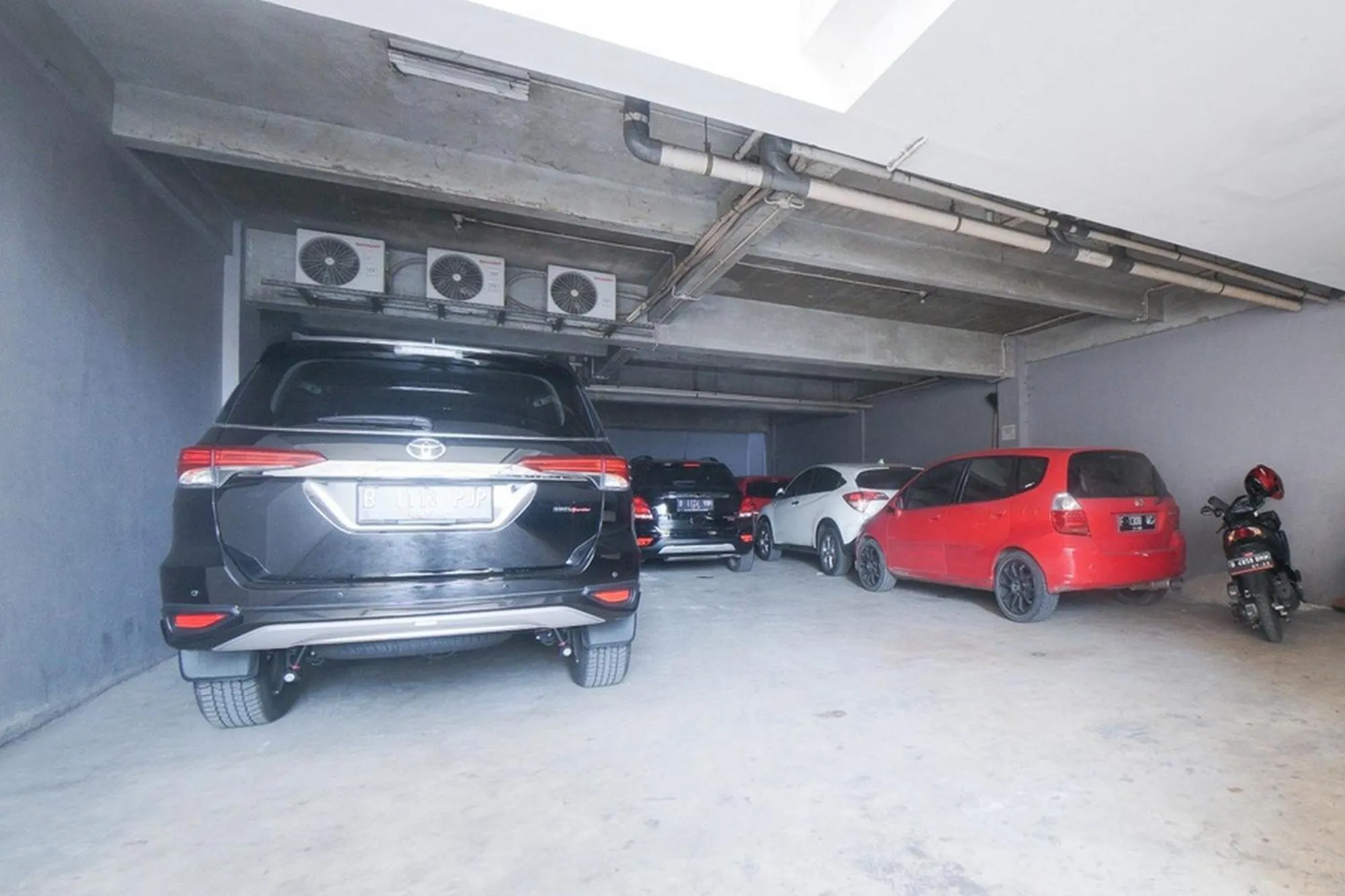 Property logo or sign in RedDoorz Plus near Green Pramuka Square Mall