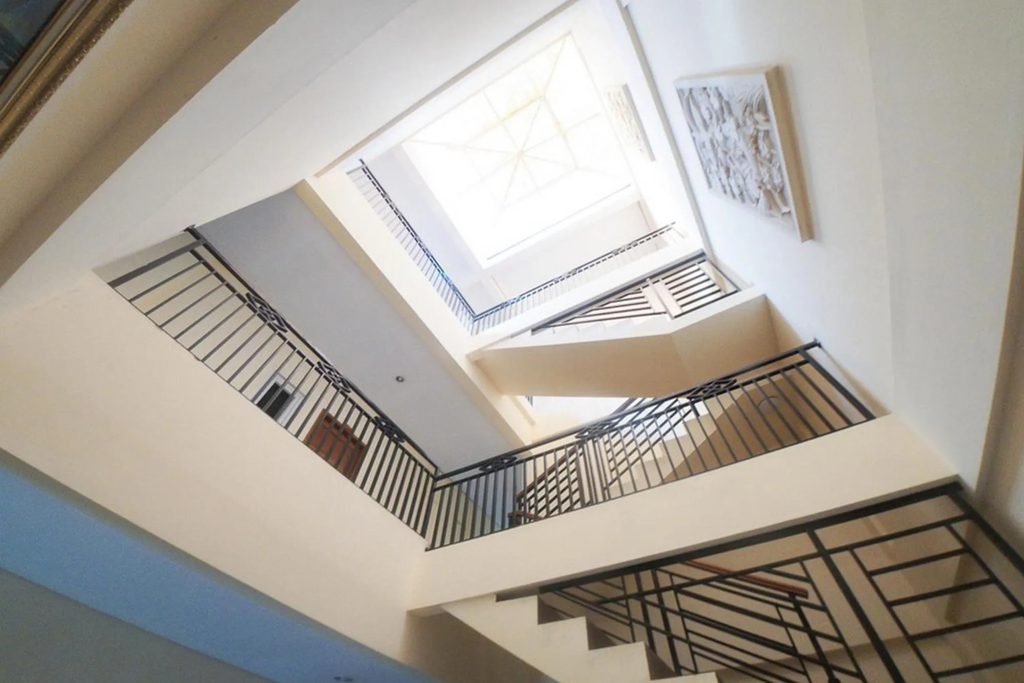 Balcony/Terrace in RedDoorz Plus near Green Pramuka Square Mall