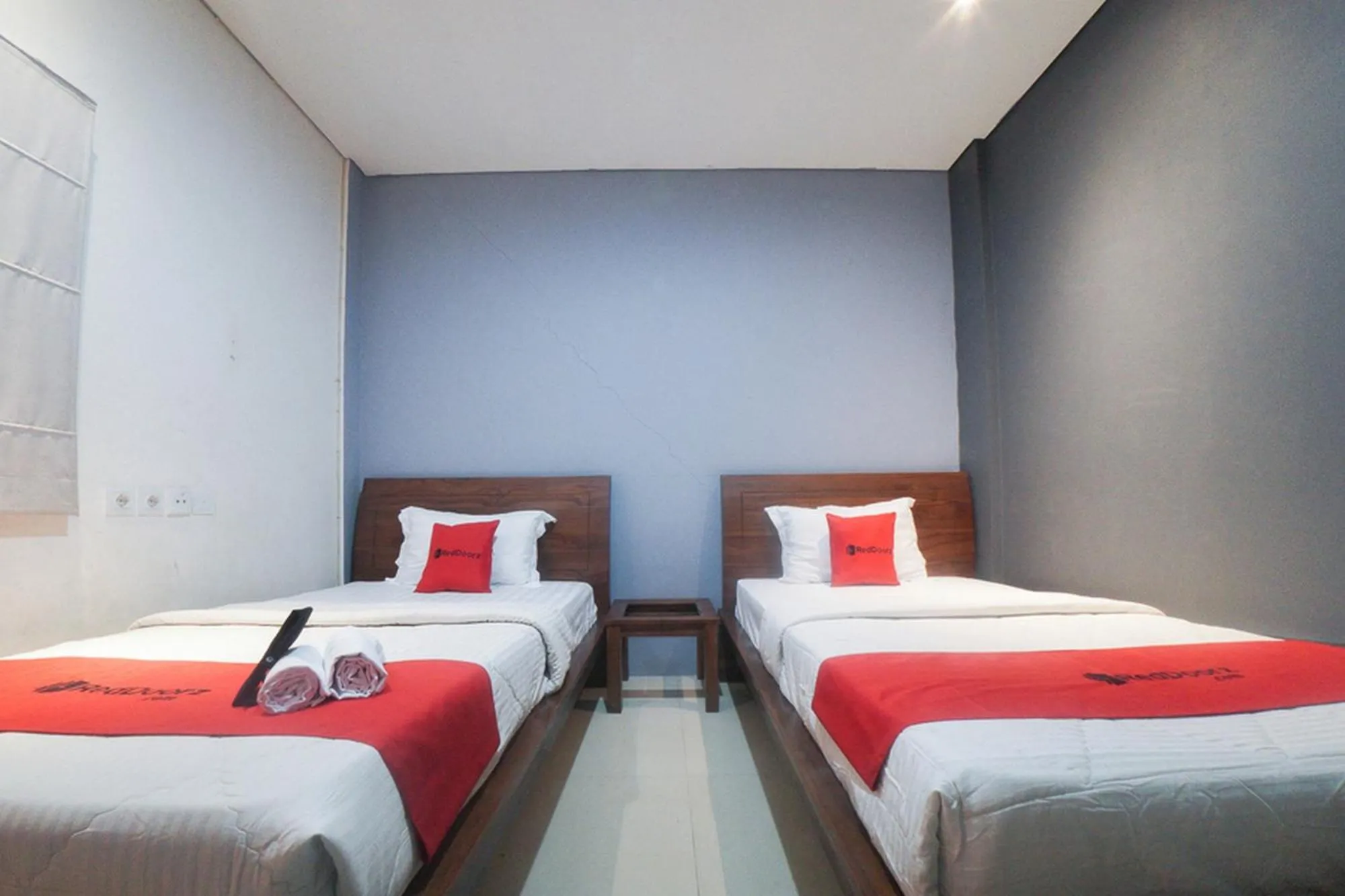 Bedroom, Bed in RedDoorz Plus near Green Pramuka Square Mall