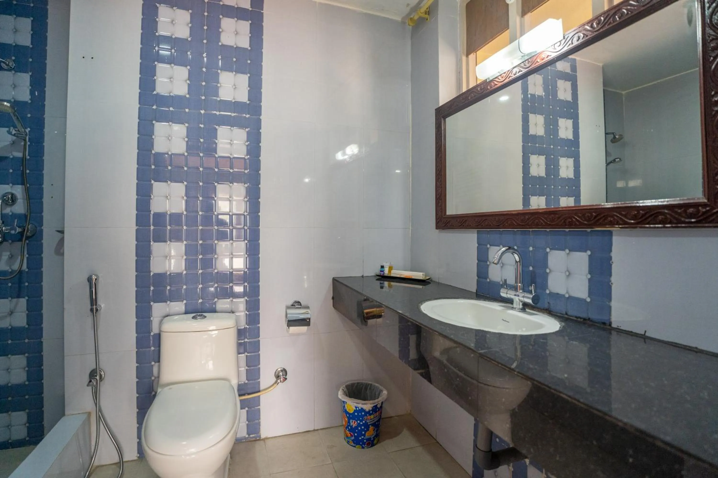 Toilet in Avocado Orchid Resort