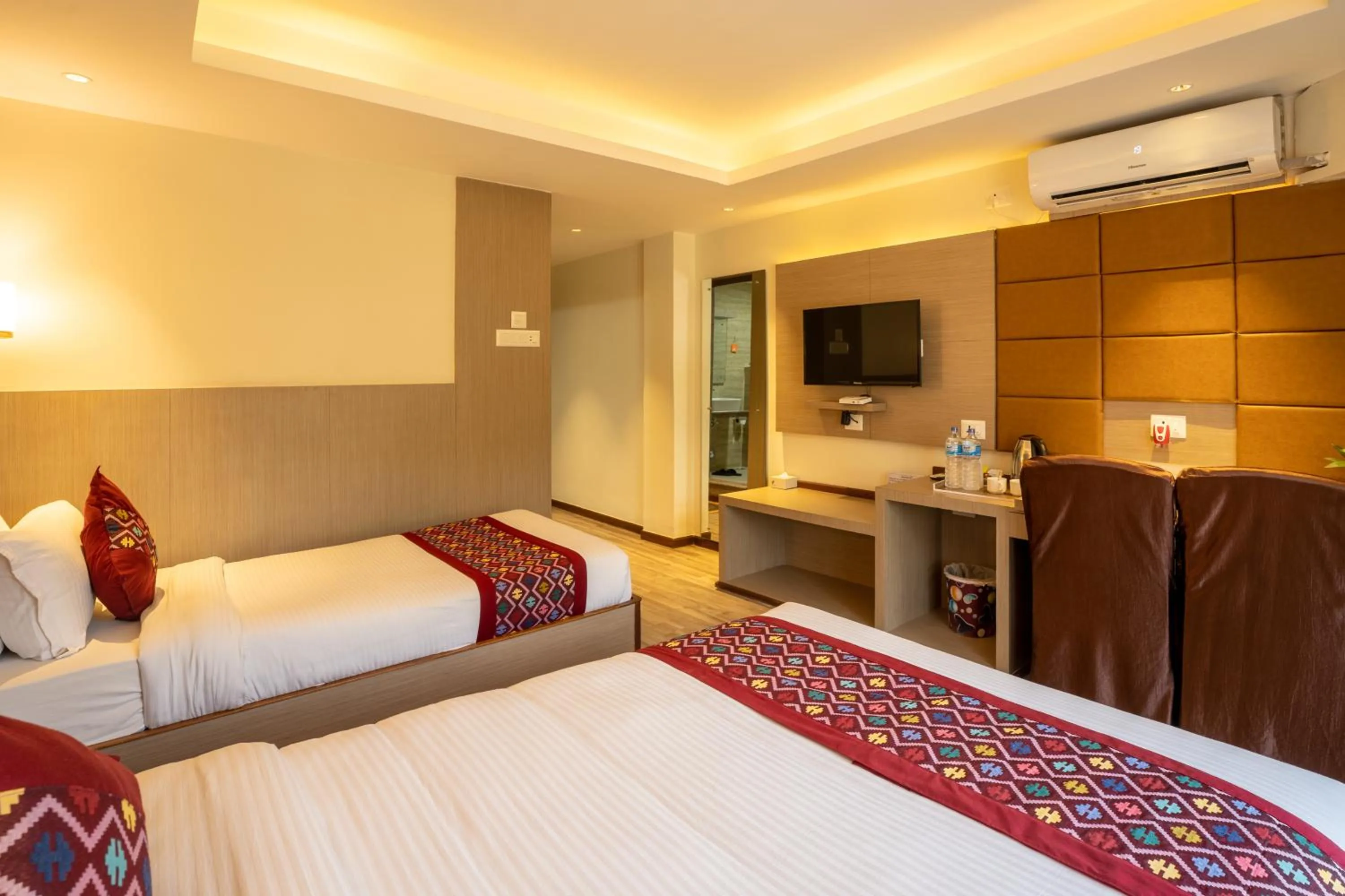 Bed in Avocado Orchid Resort