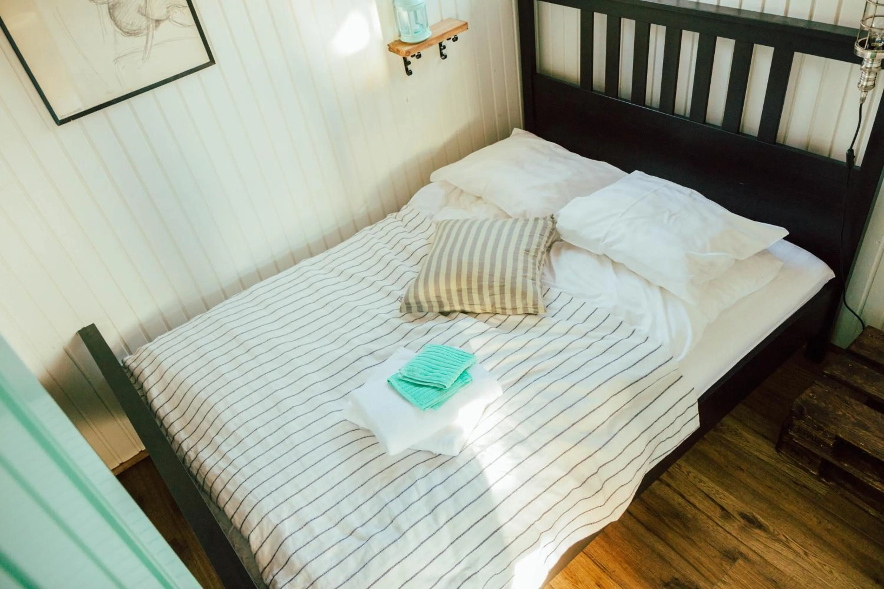 Bed in Mulakot Cosy Cabins