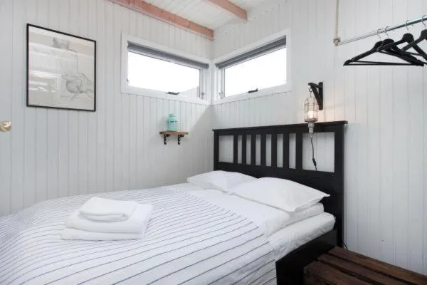 Bed in Mulakot Cosy Cabins