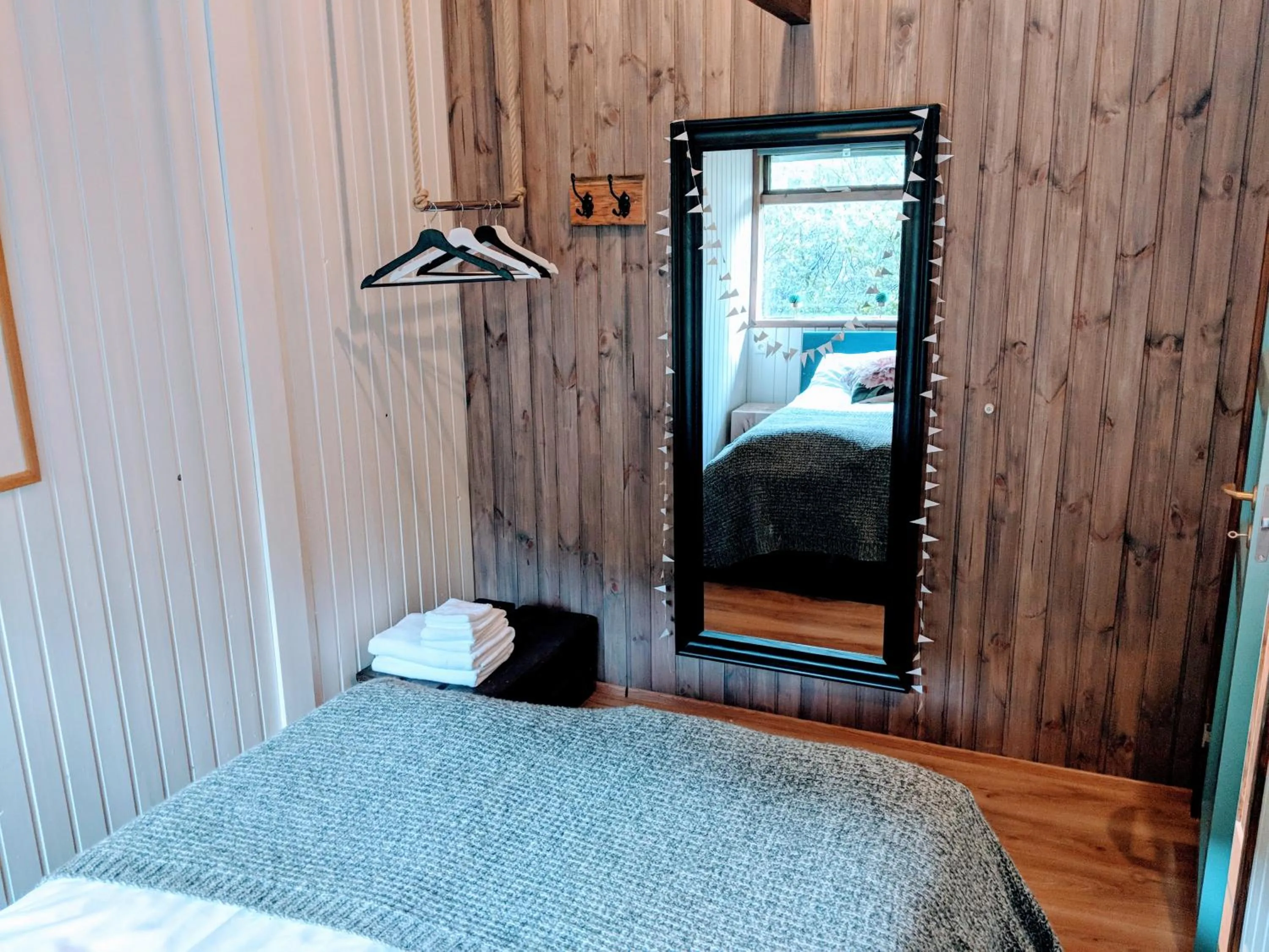 Bed in Mulakot Cosy Cabins