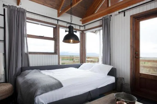 Bed in Mulakot Cosy Cabins