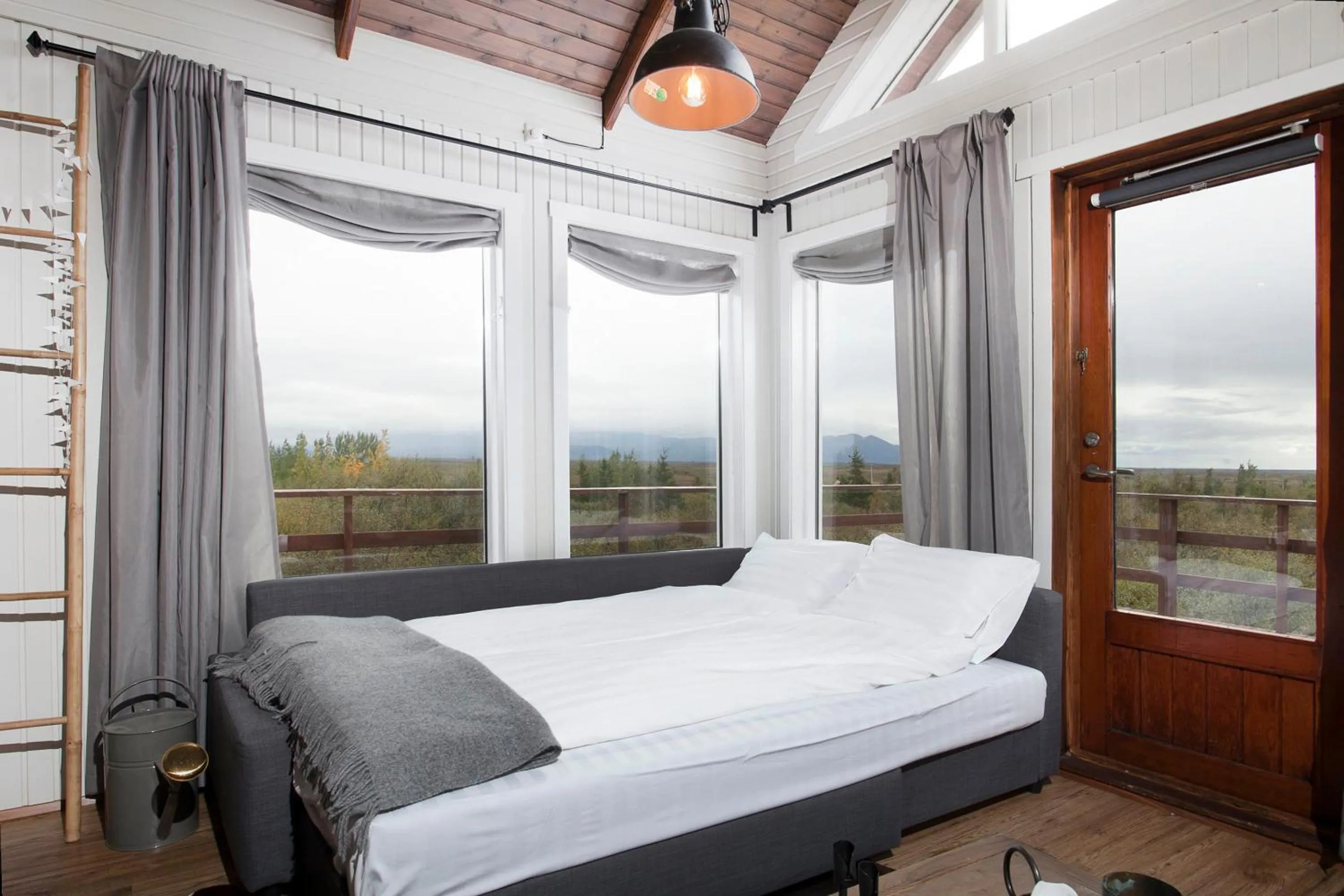 Bed in Mulakot Cosy Cabins