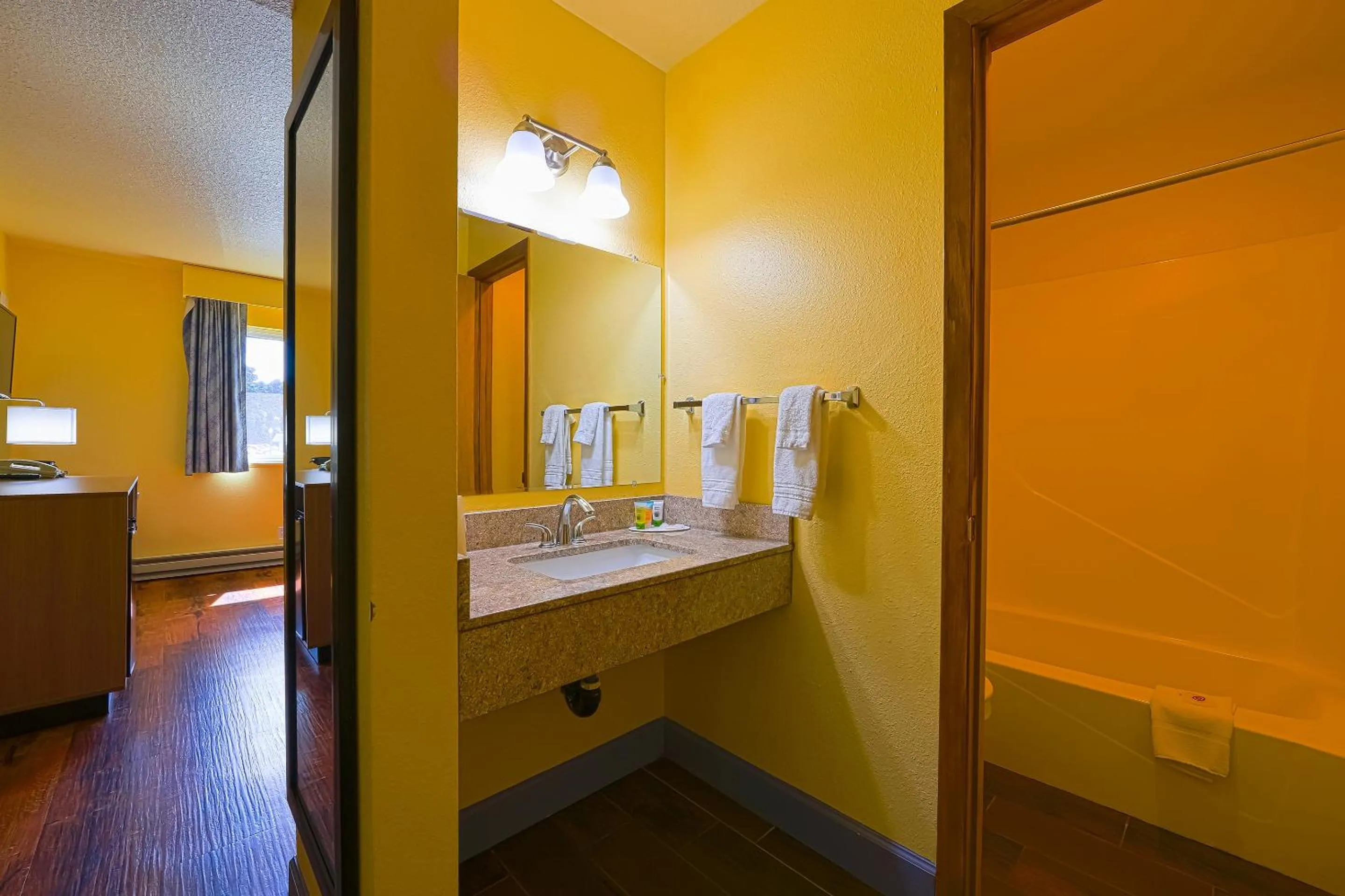 Bedroom in Coastal Inn by OYO Lincoln City - Oregon Coast Hwy