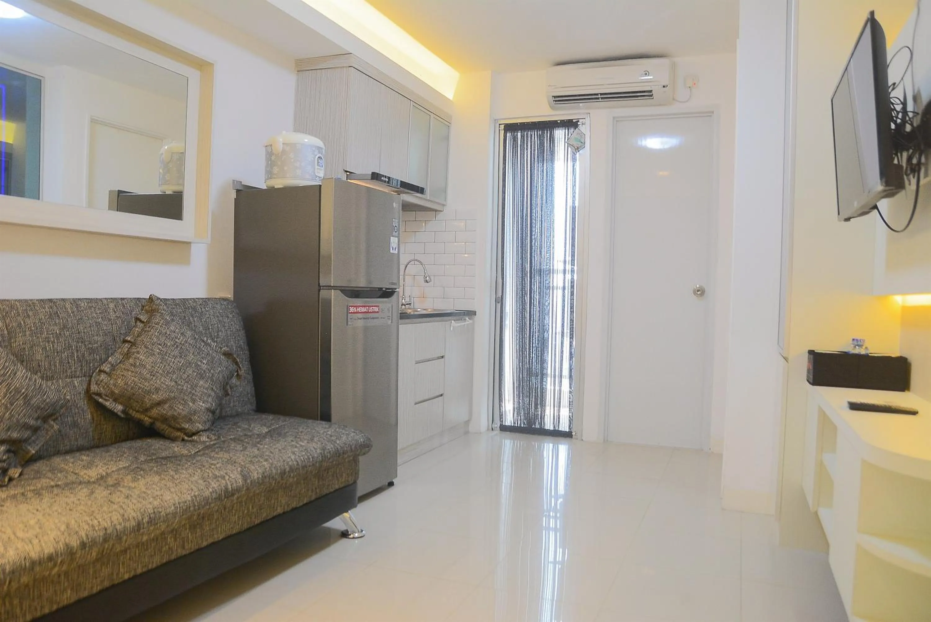Two-Bedroom Apartment in Pool View 2BR with Sofa Bed Bassura City Apartment By Travelio