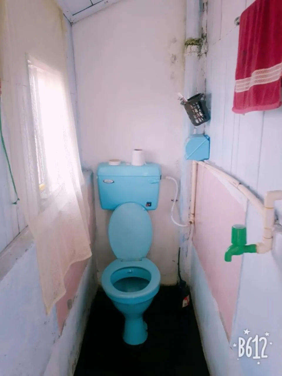 Bathroom in Quaint Wood Cottage