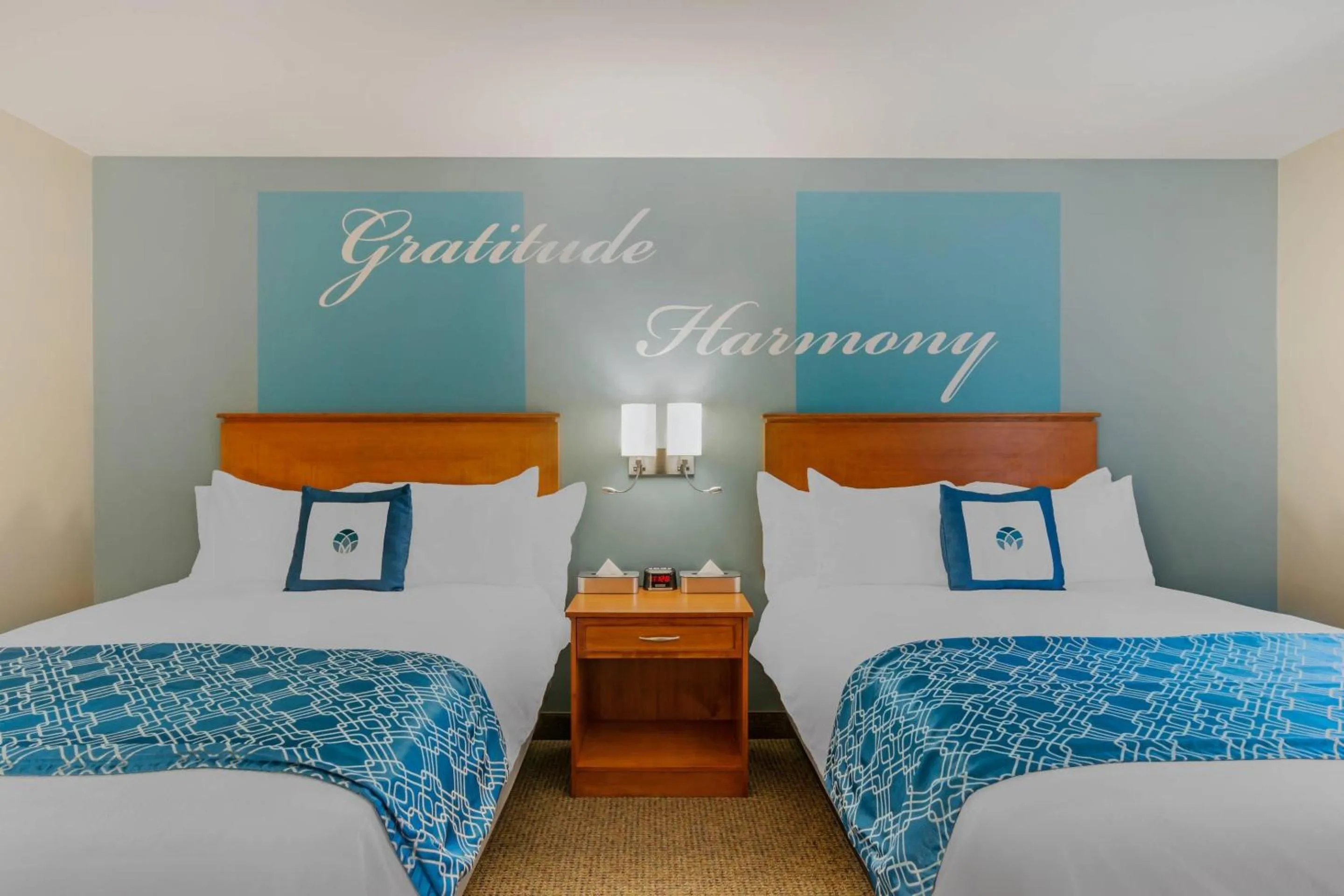 Bedroom, Bed in Unity Hotel and Conference Ctr, an Ascend Collection Hotel