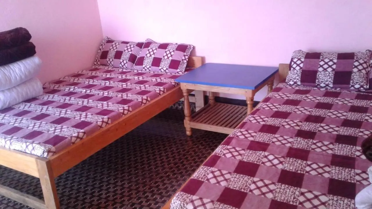 Bed in Ashis Homestay