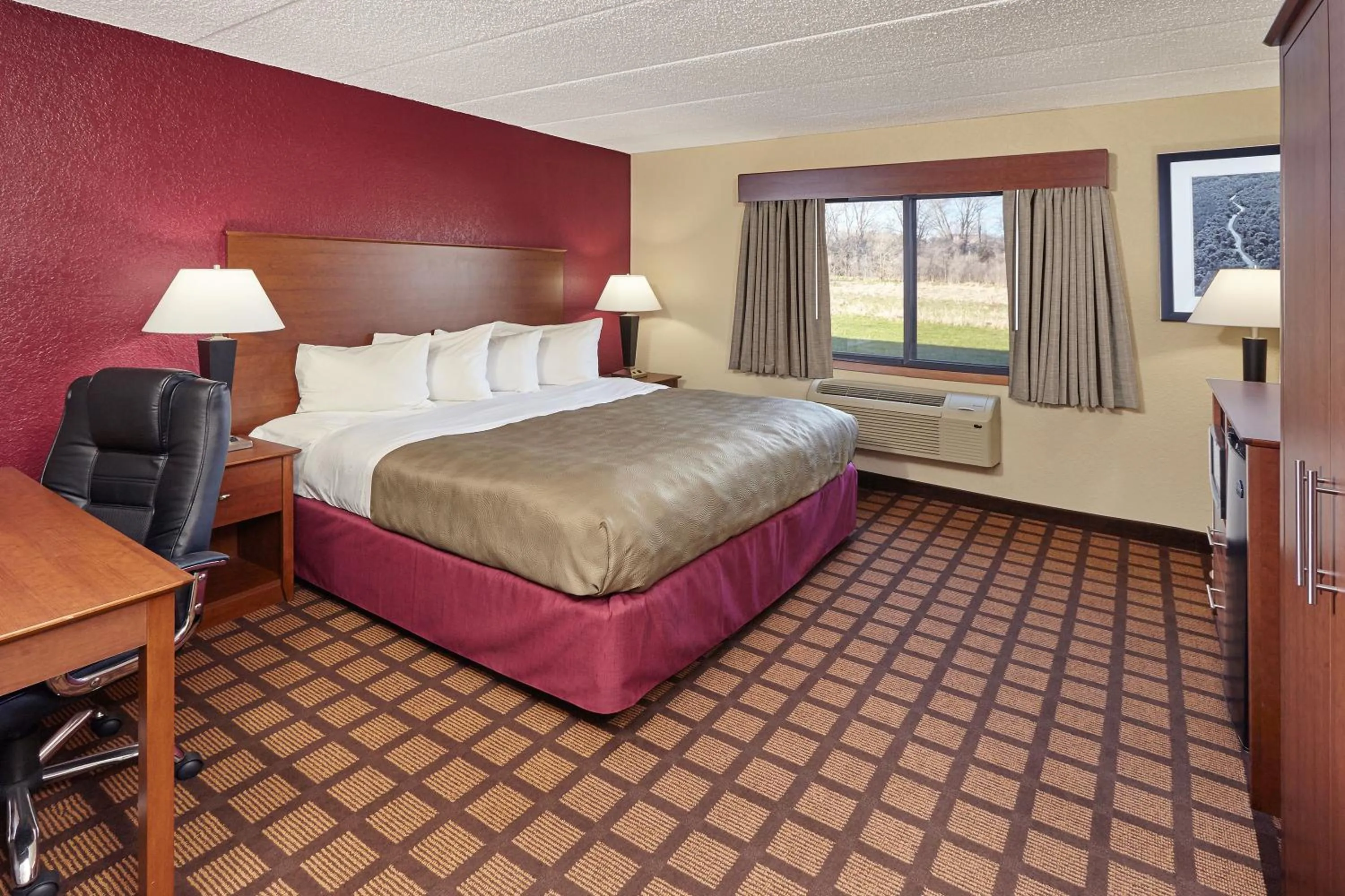 Photo of the whole room, Bed in AmericInn by Wyndham Burlington